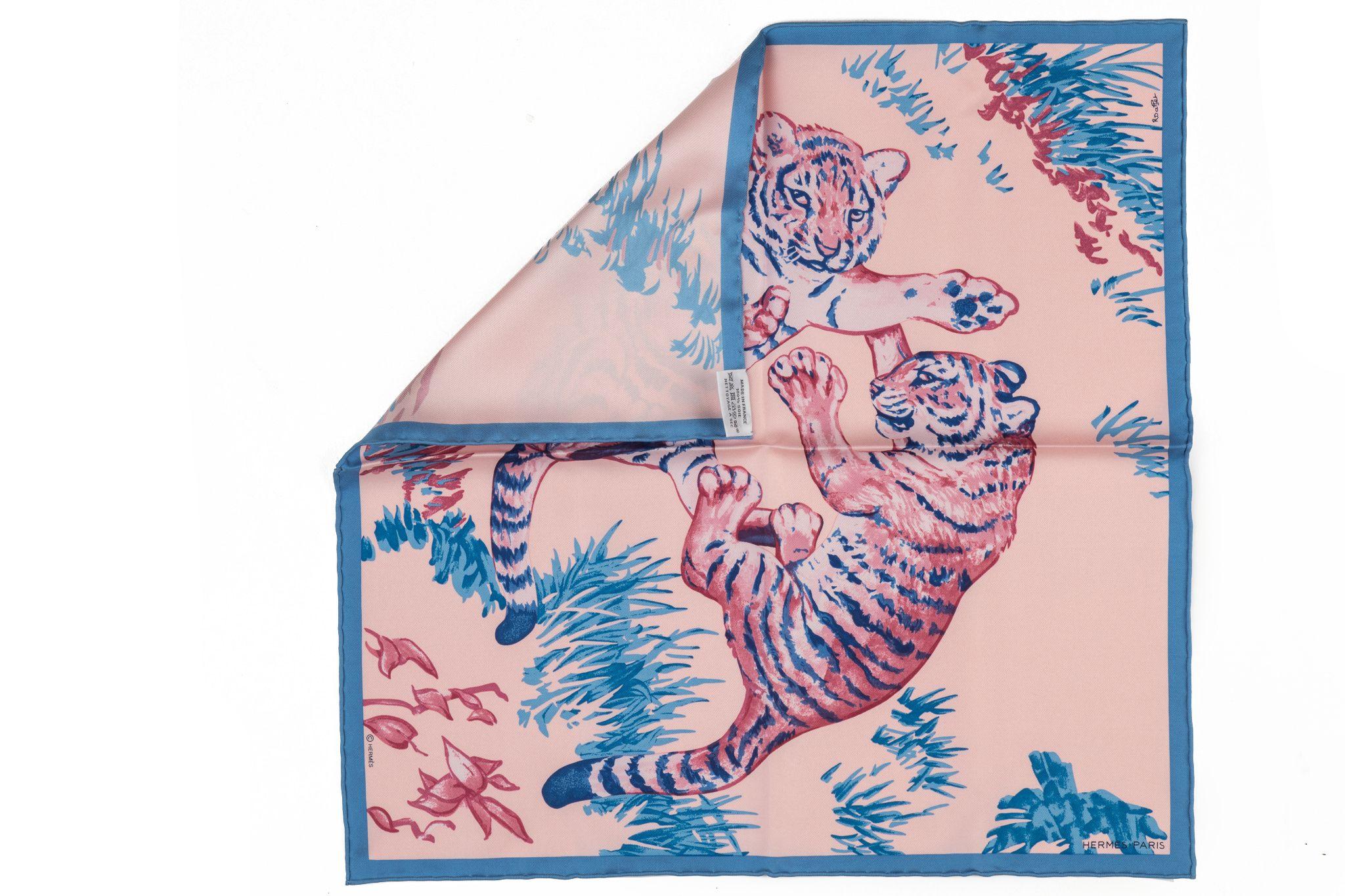 Hermès brand new rare pink and celeste tiger Cubs silk gavroche. Hand rolled trim. Comes with original box.