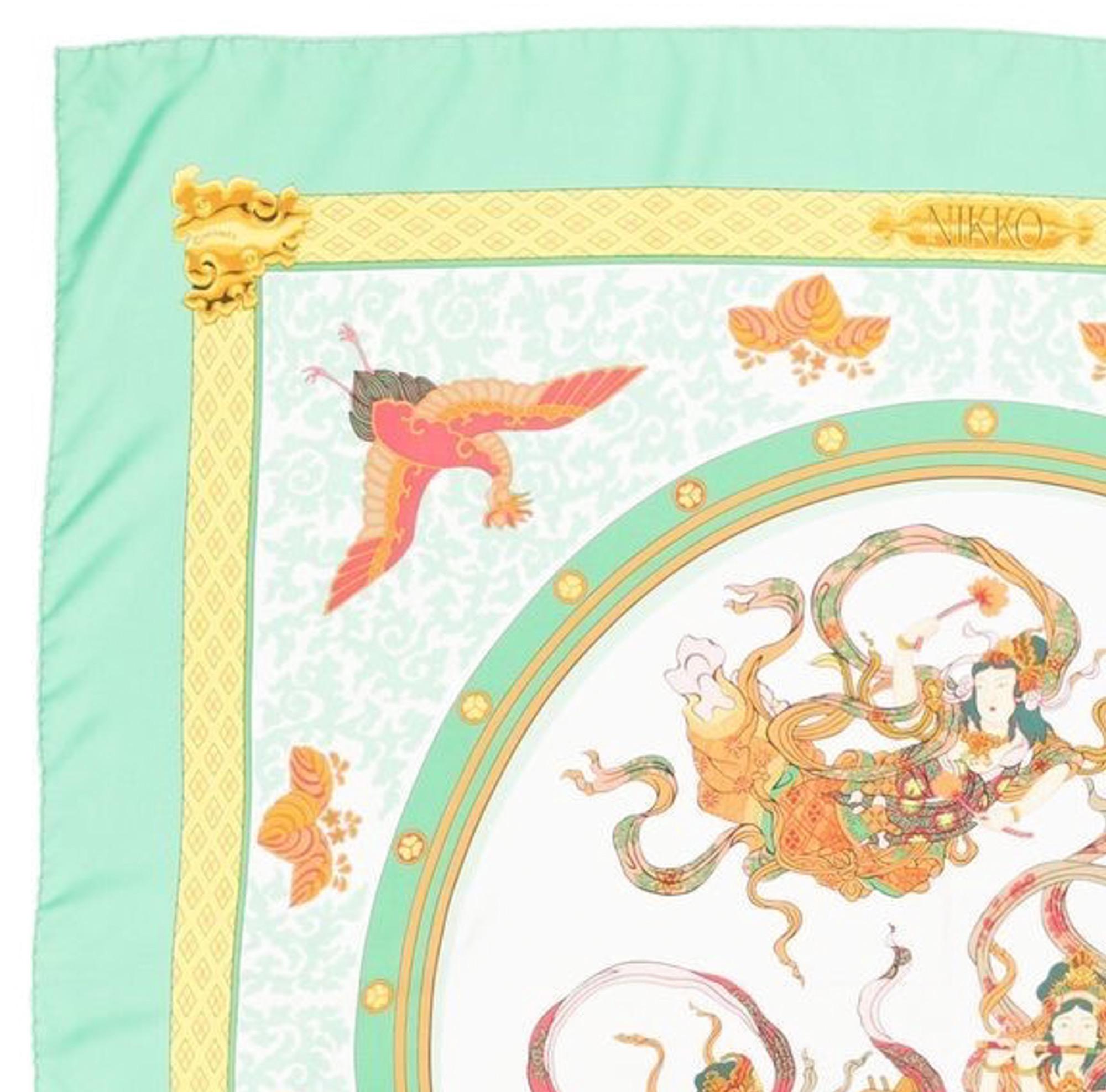 Hermes silk scarf Nikko by Dimitri Rybaltchenko featuring a green border. Circa 1995s.
In good vintage condition. Made in France.
35,4in. (90cm)  X 35,4in. (90cm)
We guarantee you will receive this  iconic item as described and showed on photos.