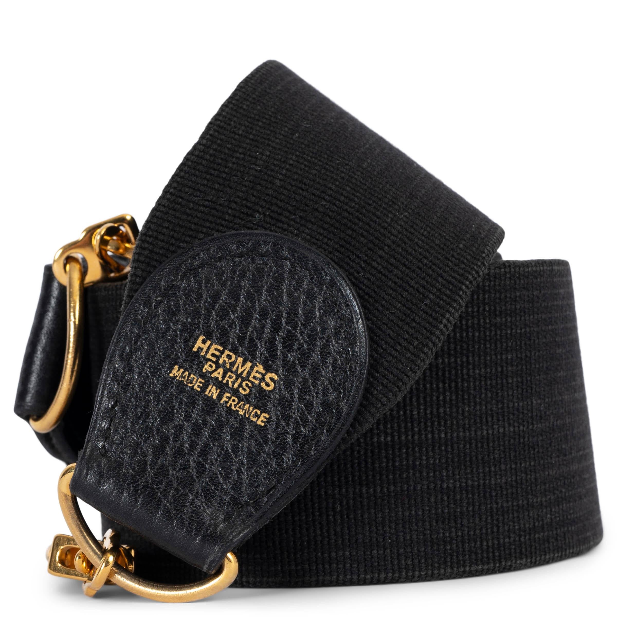 100% authentic Hermès Sangle 50mm shoulder strap for your Kelly or Evelyne bag in black canvas and leather. Has been carried and is in excellent condition.

Measurements
Width	5cm (2in)
Length	104cm (40.6in)
Hardware	Gold-Tone

All our listings