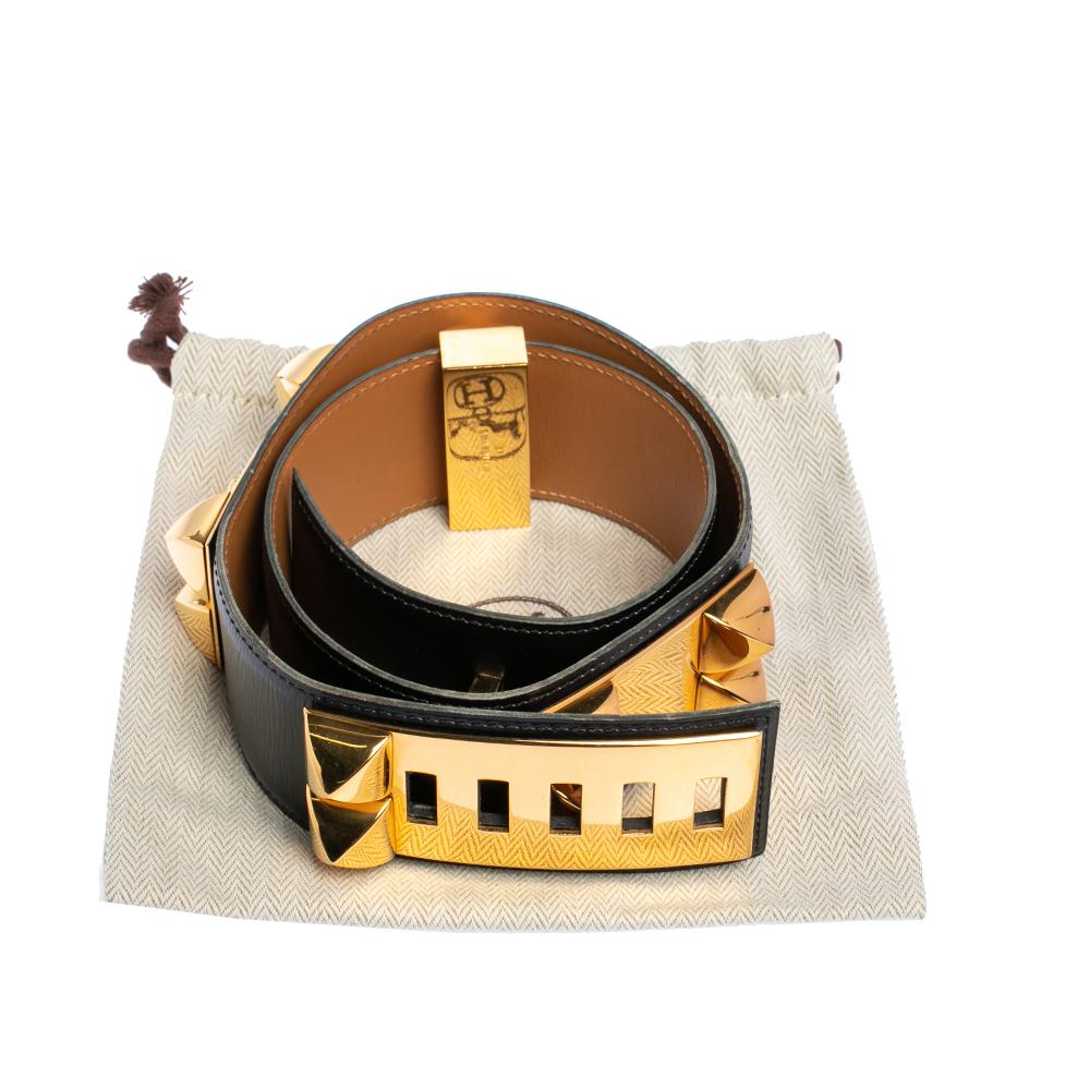 Exuding a casual, punk vibe, this instantly recognizable belt is from the famous Collier de Chien collection by Hermès. The belt, made of Noir Box leather, is adorned with the iconic Collier de Chien signature in gold-tone metal.

Includes: Original