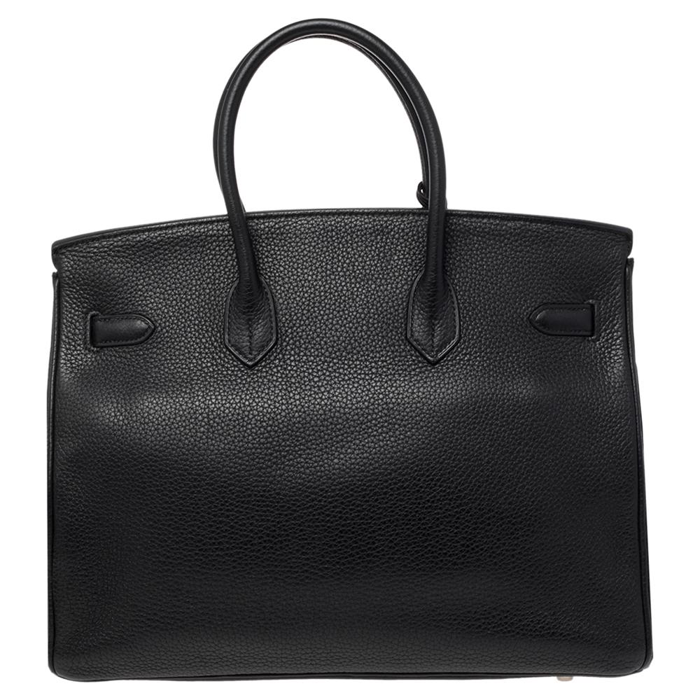 If you've been wishing to own an authentic Birkin, there is no better time to buy this coveted work of art than now. Here, we have this Noir Birkin 35 just for you. Crafted in France from Togo leather, the bag features dual top handles and a