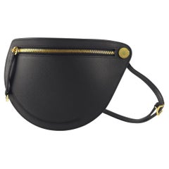 Hermès Noir Yellow gold plated Petite Course bag