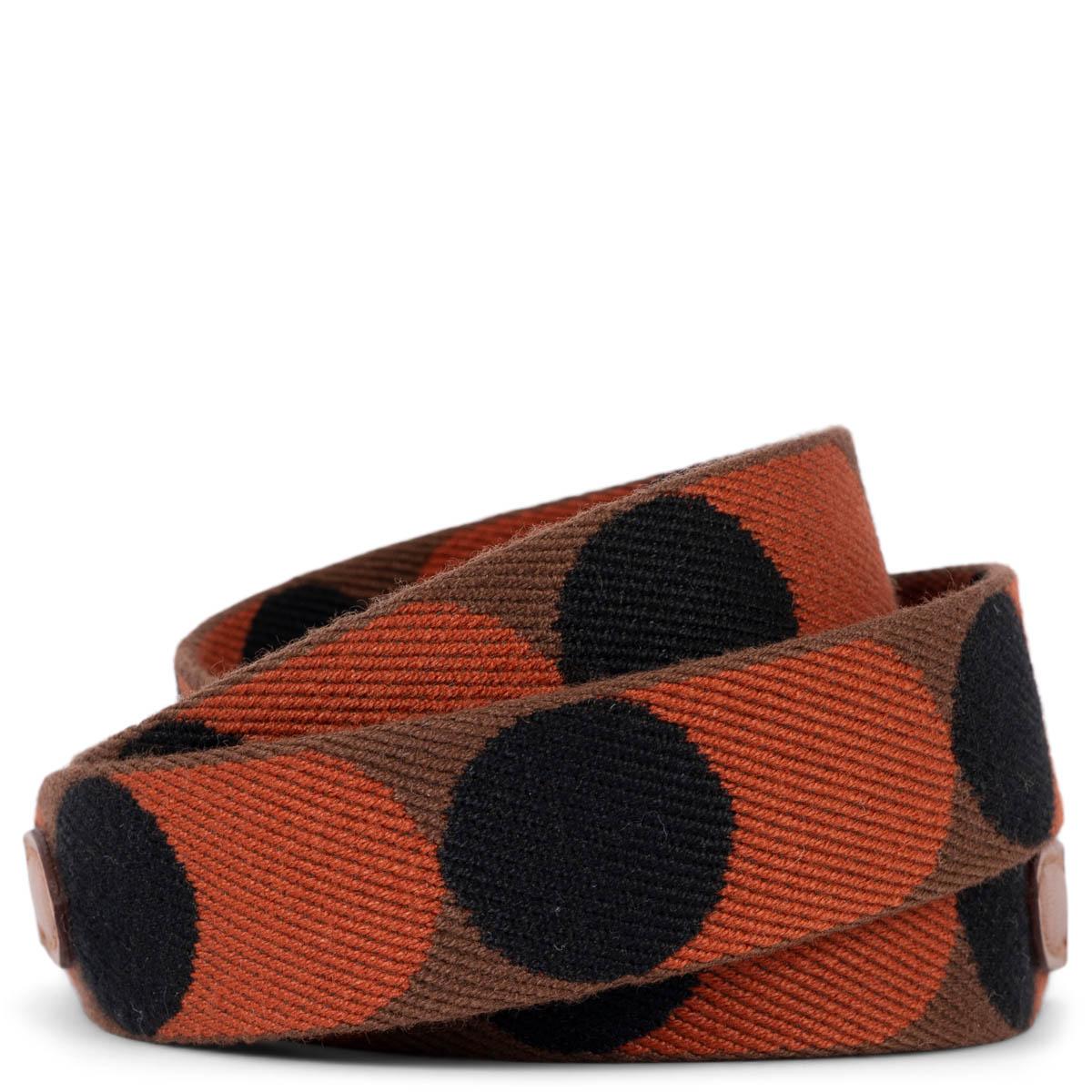 100% authentic Hermès Flipperball 25mm bag strap in camel, orange and black canvas with Gold (camel) Swift leather trims and palladium hardware. Has been carried and is in excellent condition. Comes with dust bag and box.