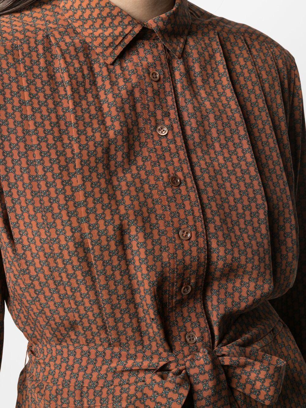 Hermes nut silk shirt dress featuring an all-over chain print, a spread collar, a front button fastening, a separated belt, a straight hem, long sleeves.  
Composition: 100% silk 
Estimated size: 40fr/US8/UK12
In good  vintage condition. Made in