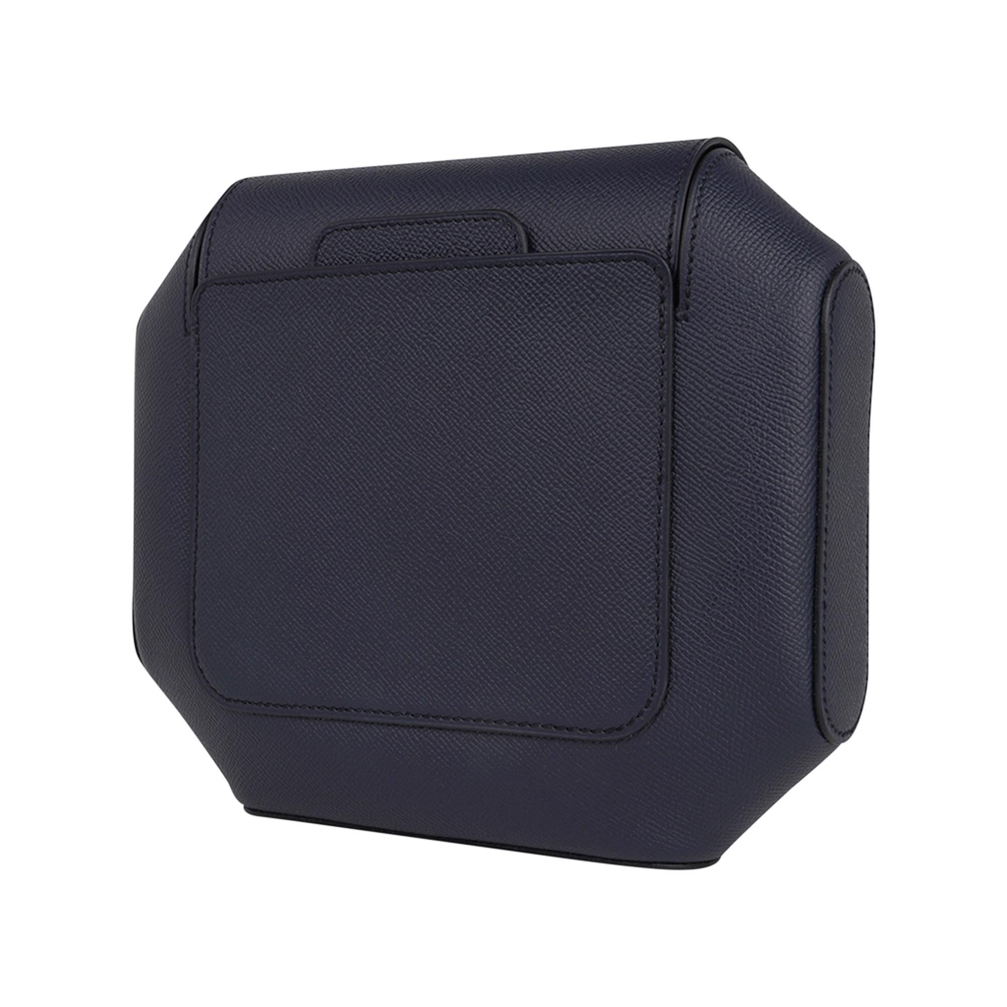 Mightychic offers a limited edition Hermes Octogone Pochette clutch bag featured in Bleu Indigo.
