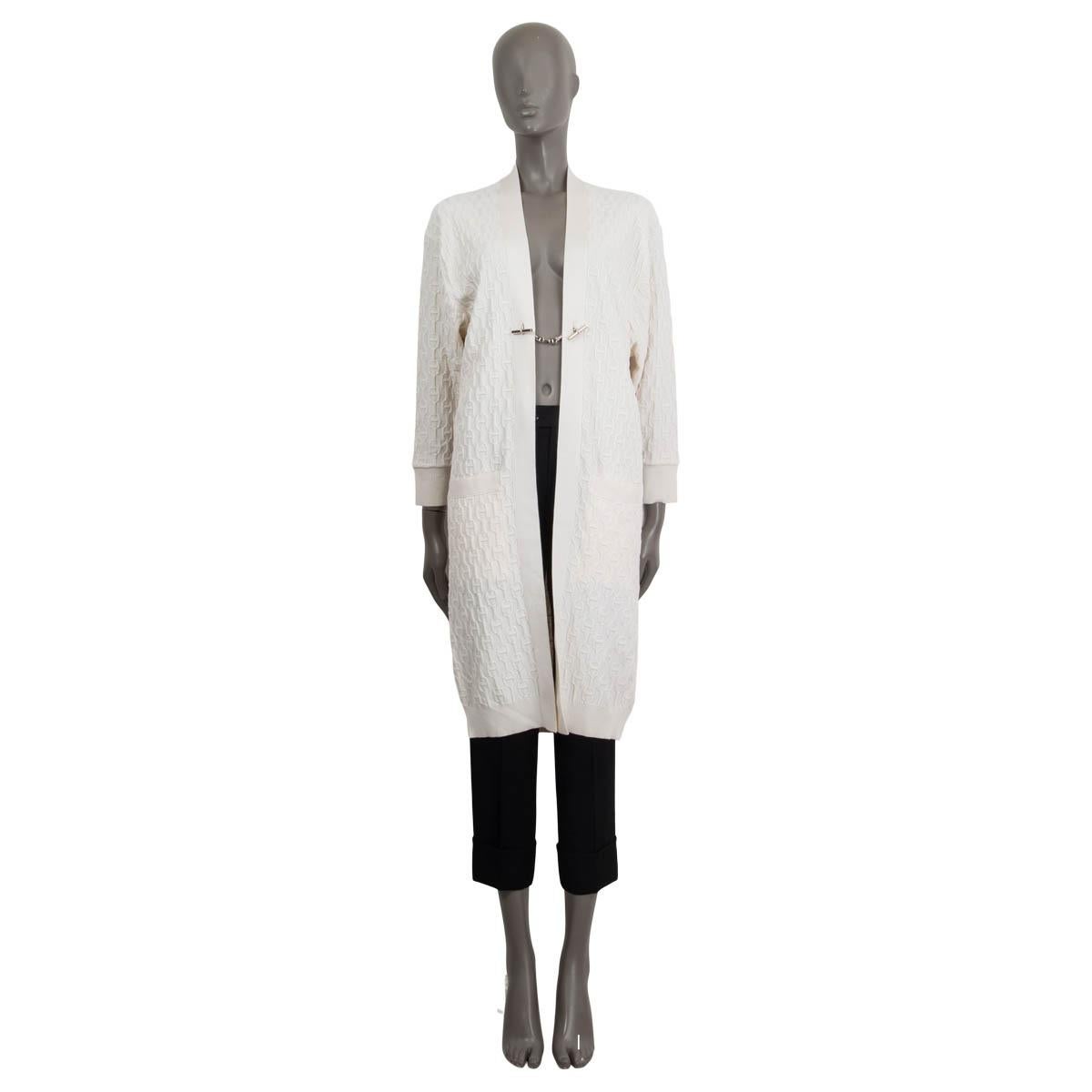 100% authentic Hermès long-cut cardigan in off-white cashmere (48%), silk (47%) and polyurethane (1%). Embellished with 'Chaines d`Ancres' embroidery all over the cardigan. Opens with a silver 'Chaines d'Ancres' chain on the front. Unlined. Has been
