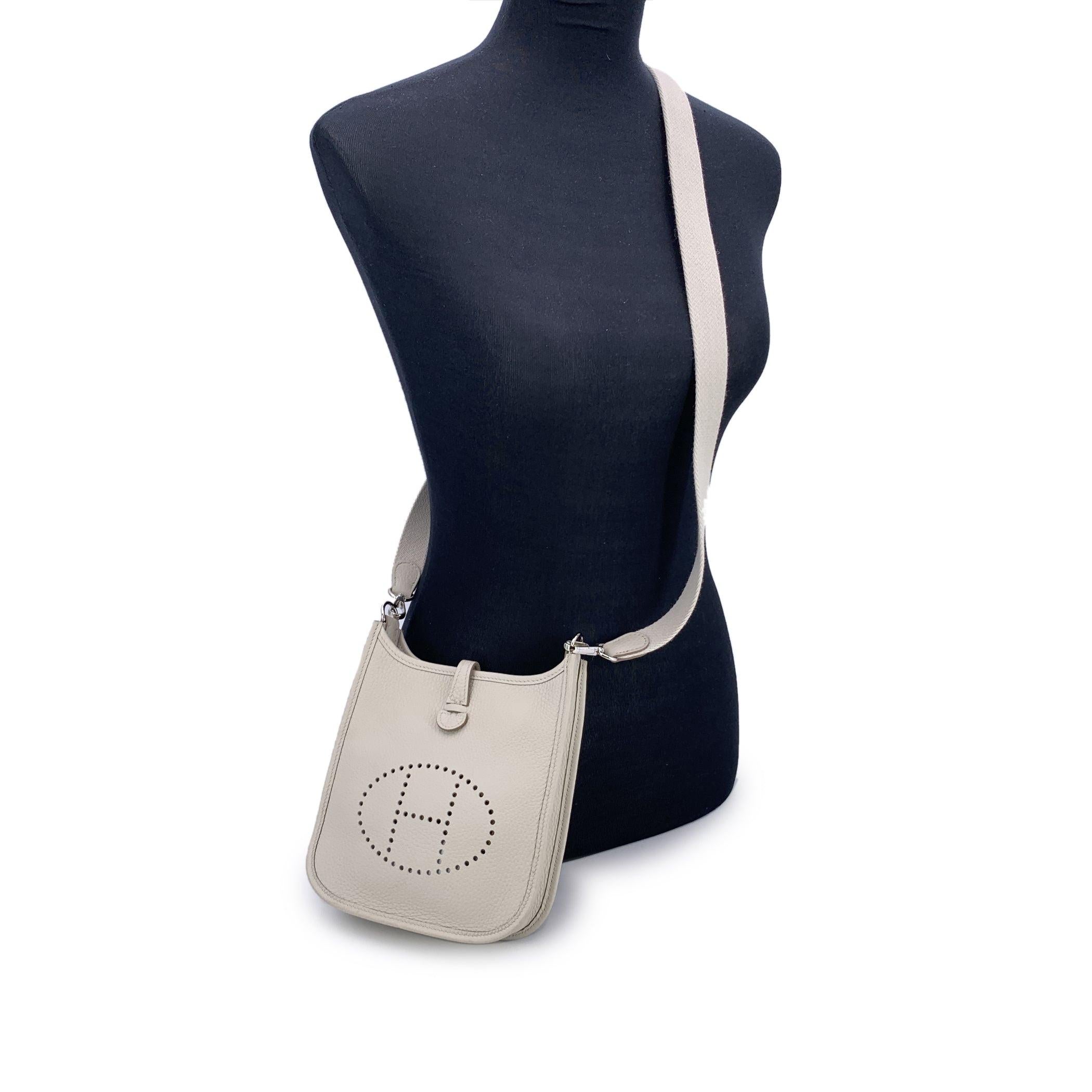 This beautiful Bag will come with a Certificate of Authenticity provided by Entrupy. The certificate will be provided at no further cost. Introducing the timeless elegance of the Hermes 'Mini Evelyne 16 Amazone' shoulder bag, crafted in sumptuous
