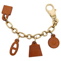 Authentic Hermès 2004 ANNEE DE LA FANTAISIE Cadena Padlock Bag Charm Gold