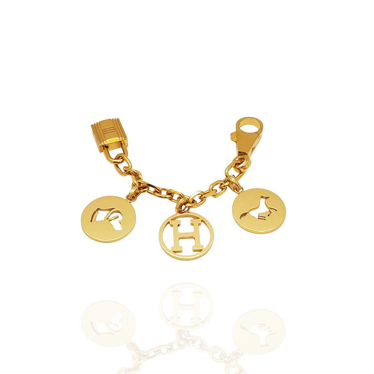 Hermès Olga Breloque Gold Bag Charm at 1stDibs