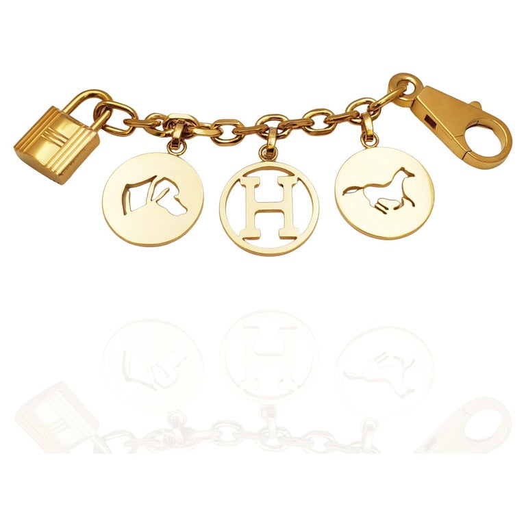 Hermès Olga Breloque Gold Bag Charm at 1stDibs