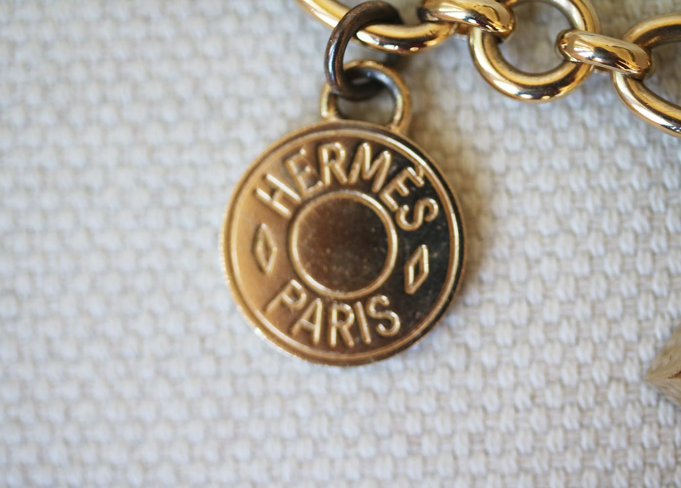 hermes gold bag charm