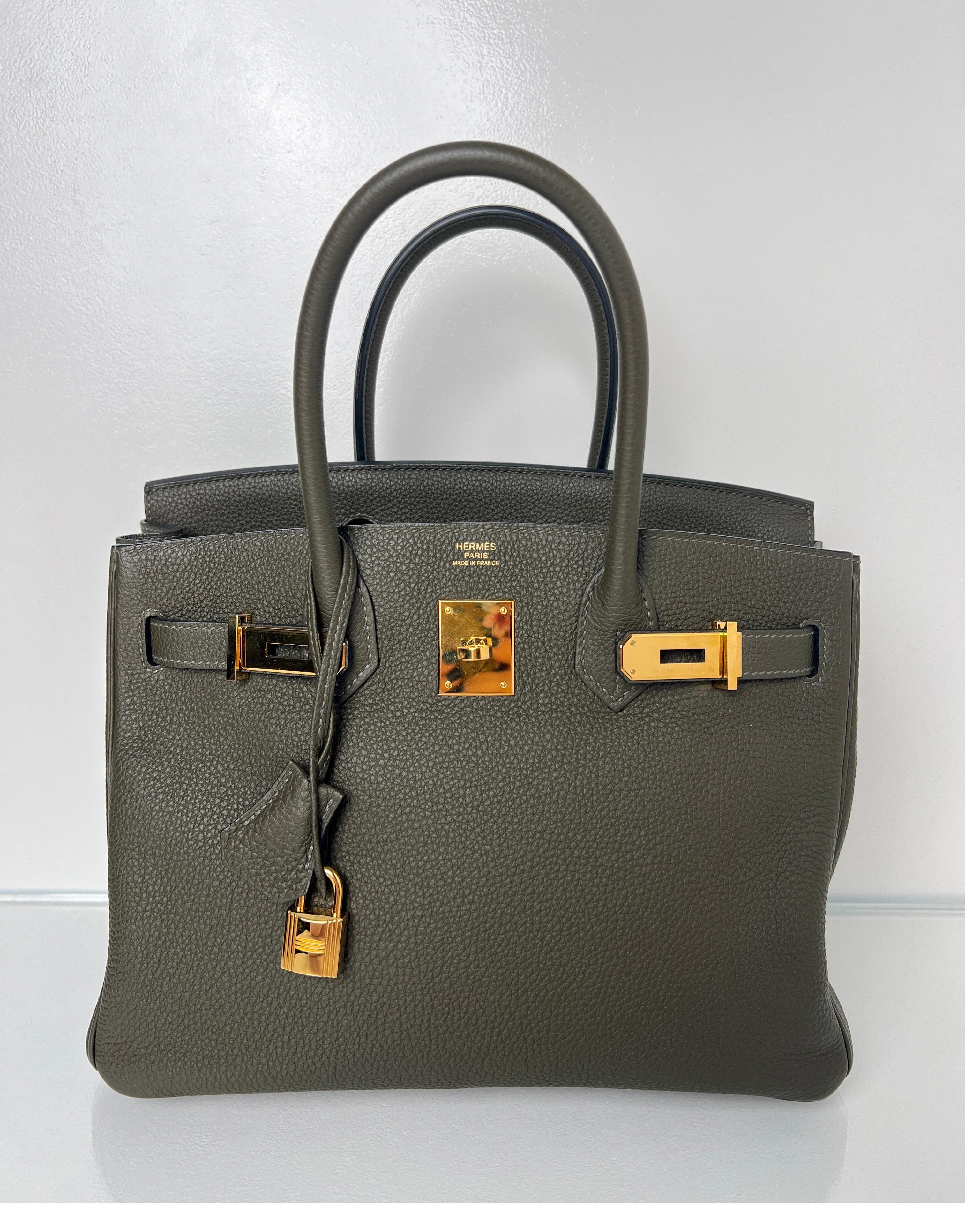Hermes Olive Birkin 30 Bag. Beautiful olive green color with gold hardware. Togo leather. Rare color and size. Interior clean. New bag in excellent collection. Includes clochette, lock, keys, and dust bag. Guaranteed authentic. 