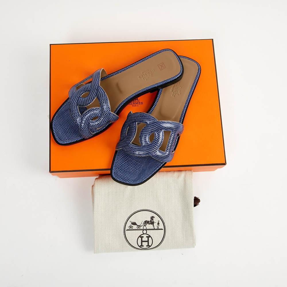 Never worn Hermes Omaha made of blue  lizard  in mint condition with the box. Beautiful Chaine d'Ancre cutout over the top of the foot. heel with leather sole. Size 37 French