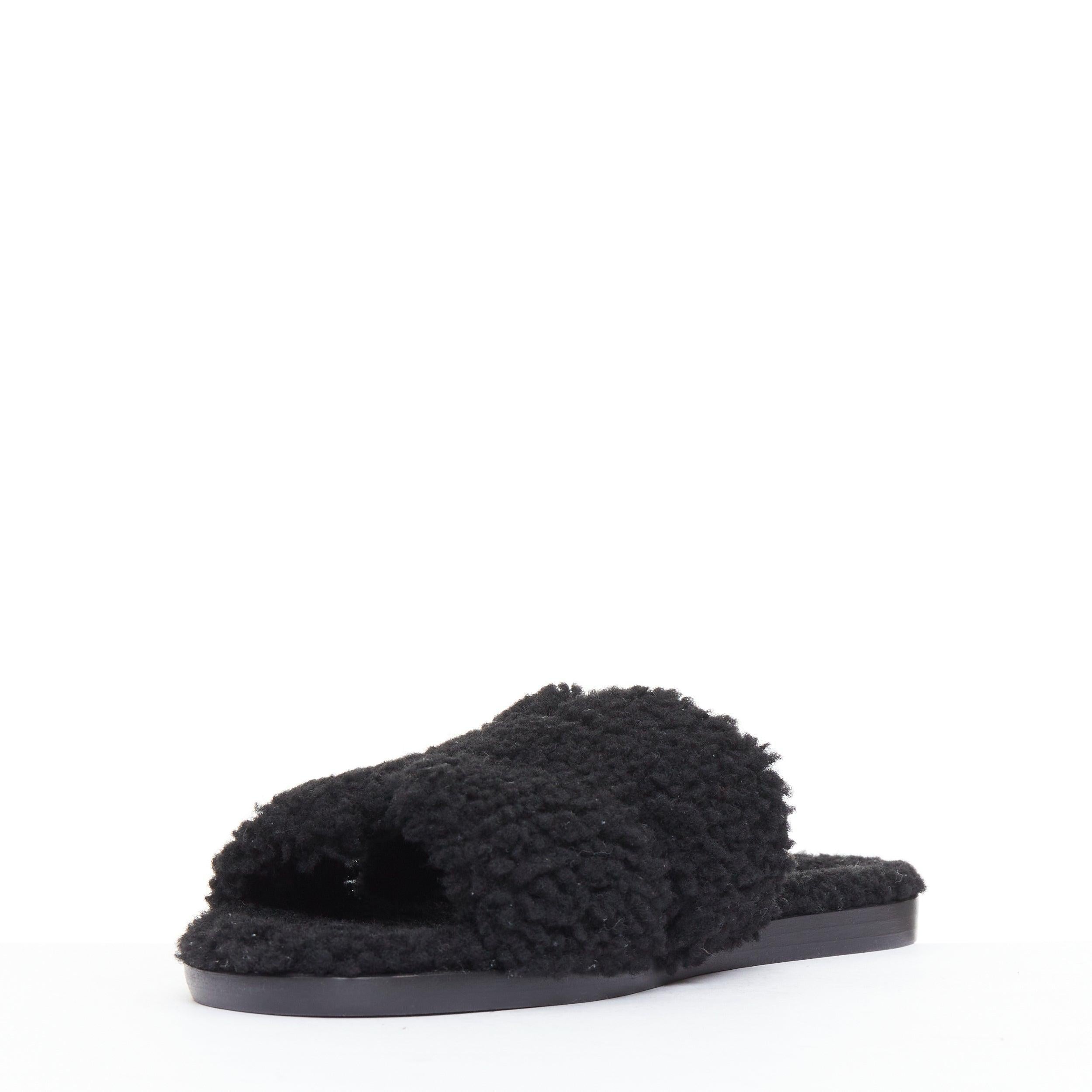 HERMES Oran noir shearling H cut out flat block sandals EU41.5 Excellent état - En vente à Hong Kong, NT