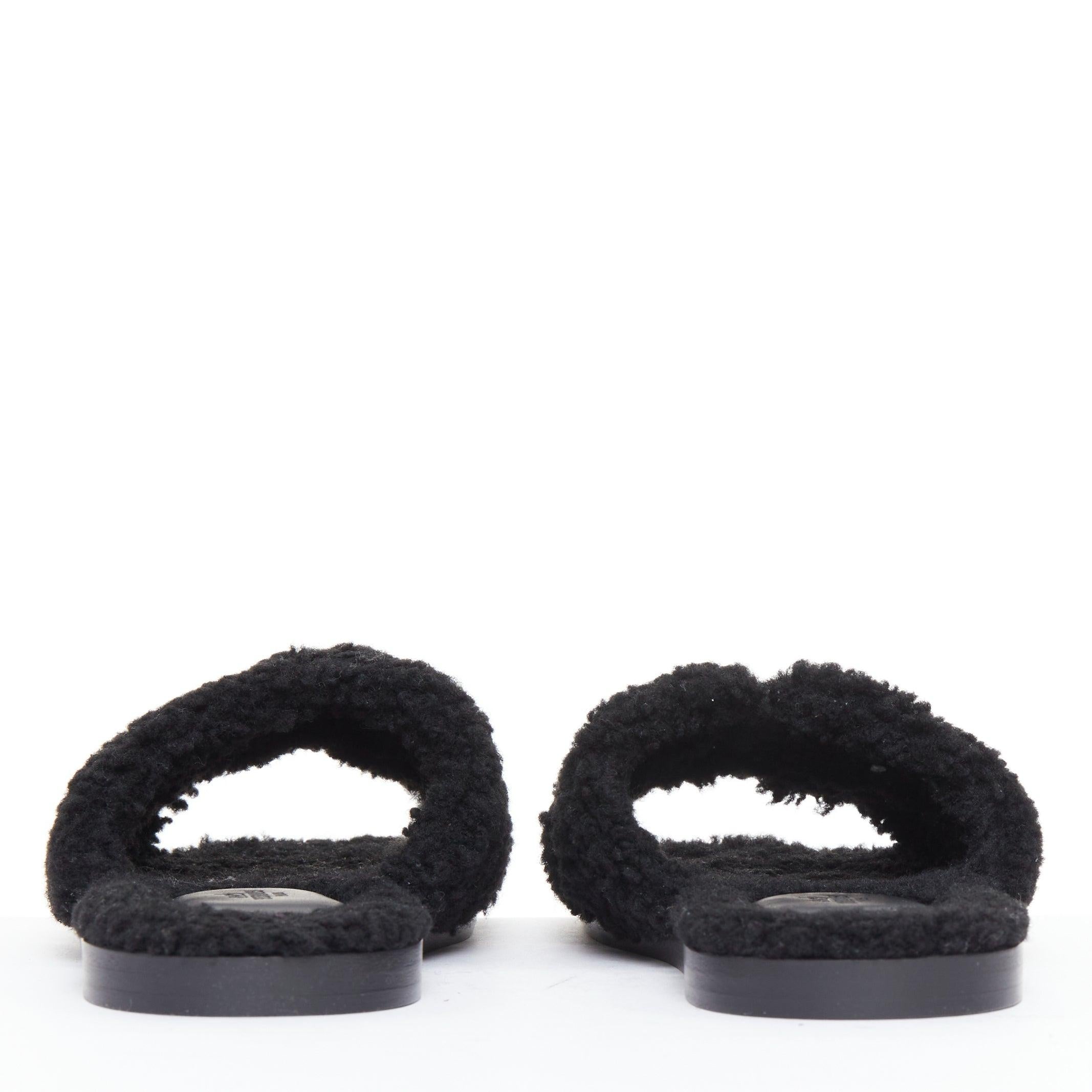 HERMES Oran noir shearling H cut out flat block sandals EU41.5 Pour femmes en vente