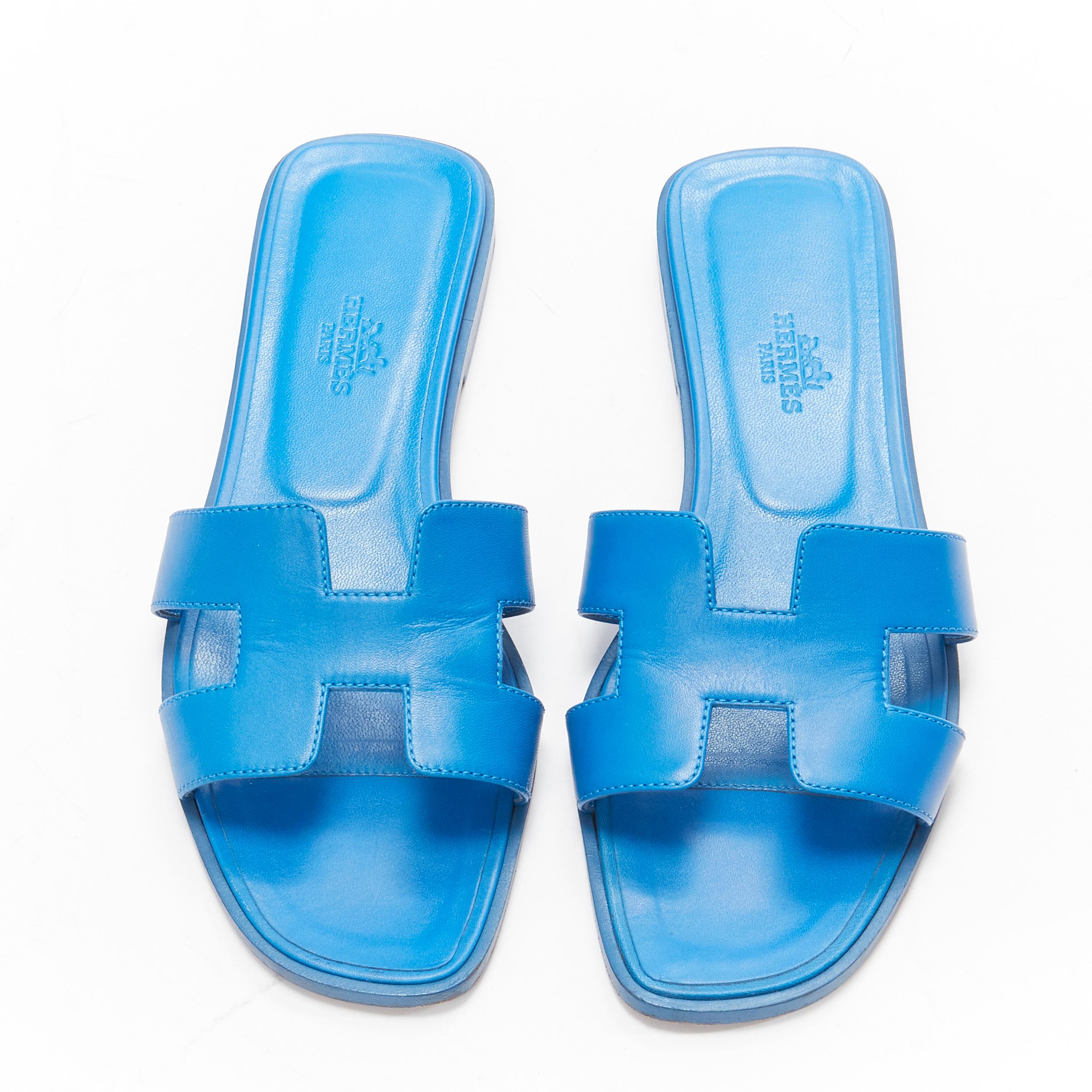 HERMES Oran kobaltblau Glattleder H flache Sandalen EU37.5 7