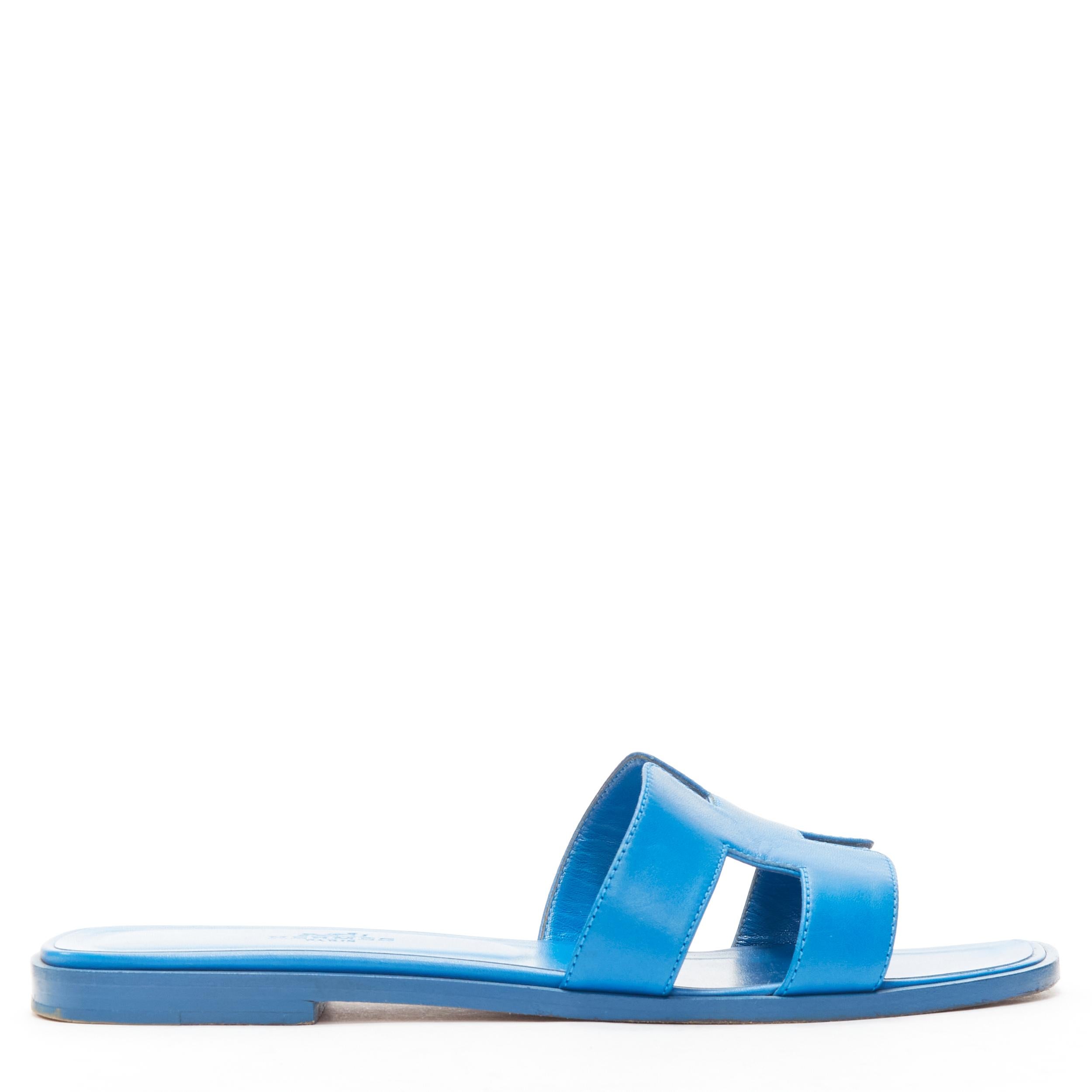 HERMES Oran cobalt blue smooth leather H flat sandals EU37.5
Reference: LNKO/A02143
Brand: Hermes
Model: Oran
Material: Leather
Color: Blue
Pattern: Solid
Closure: Slip On
Lining: Blue Leather
Made in: Italy

CONDITION:
Condition: Very good, this