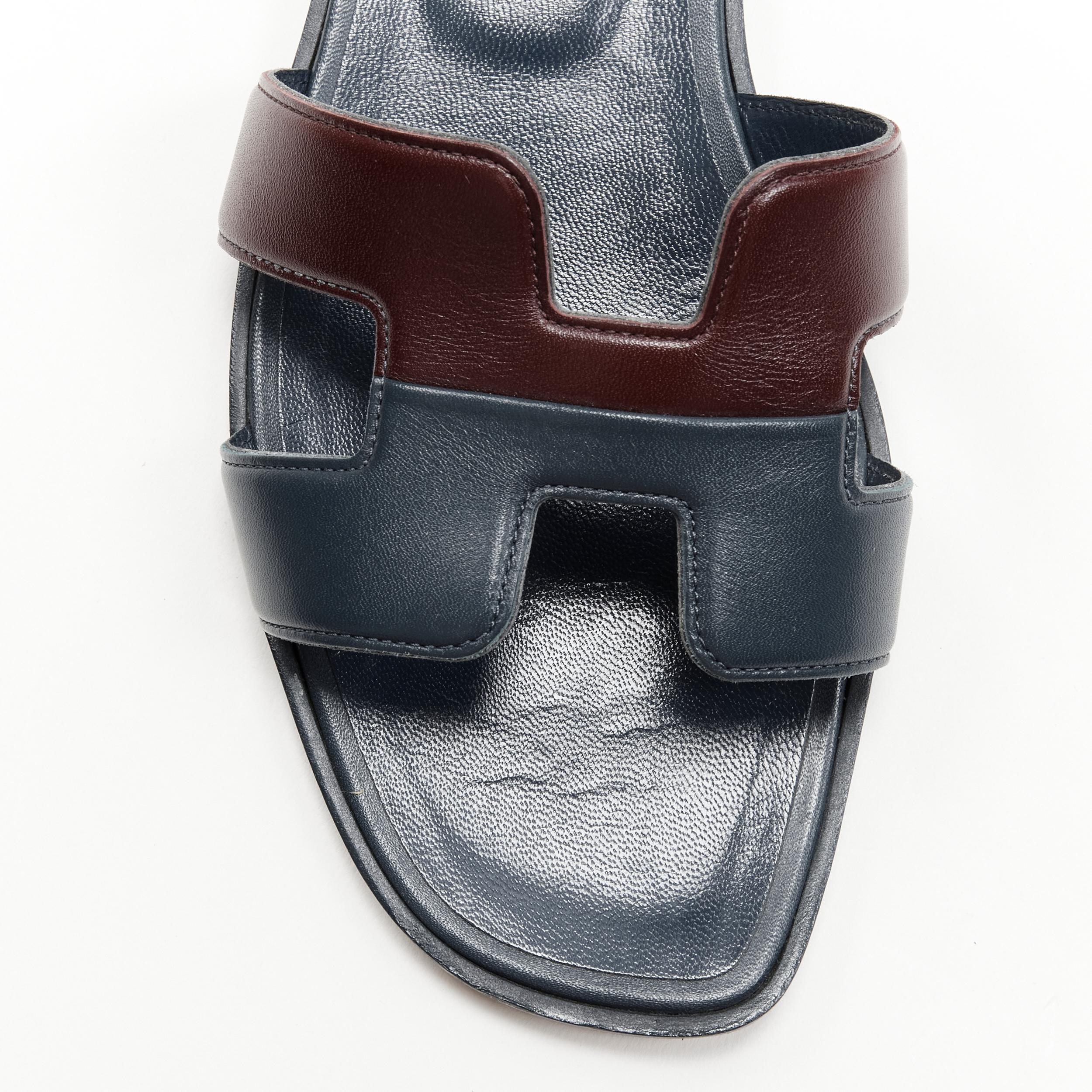 Gray HERMES Oran dual tone burgundy navy leather H flat sandals EU37.5