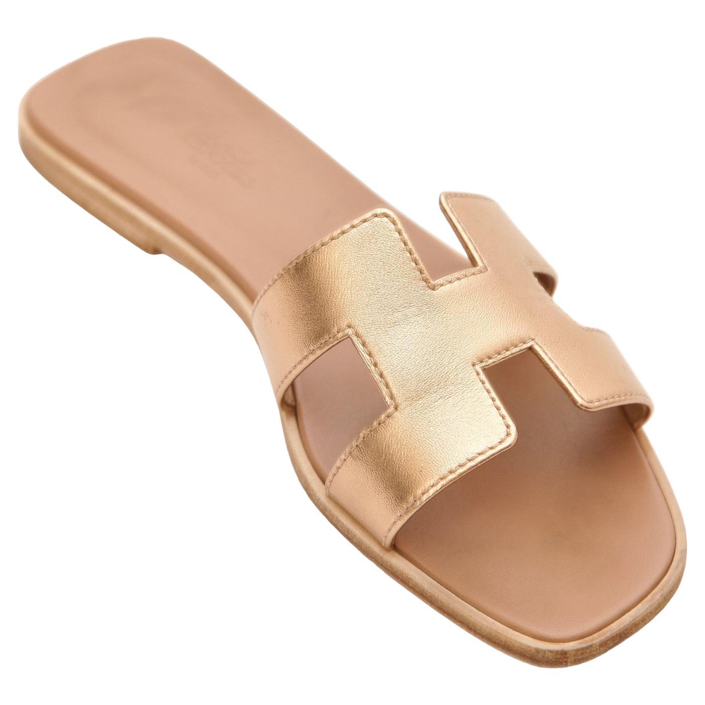 HERMES Oran Leather Sandal Rose Gold Metallic H Flat Slide Sz 38