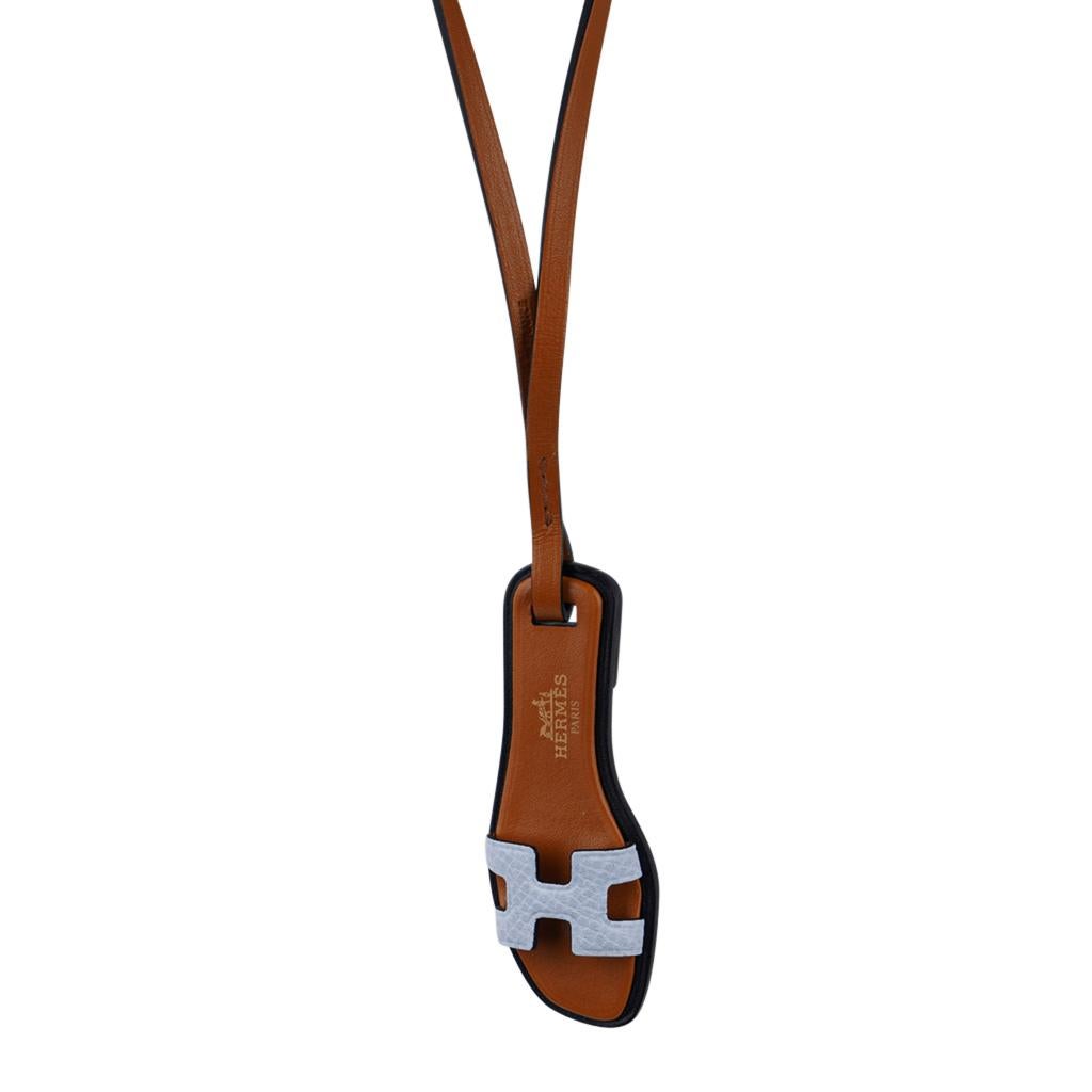 Mightychic offers an Hermes Oran Nano bag charm featured in pretty Bleu Brume.
Charming and playful she easily adorns a myriad bag colours in your fabulous collection.
Hermes Paris hot stamp on the upper sole.
Comes with signature Hermes box and