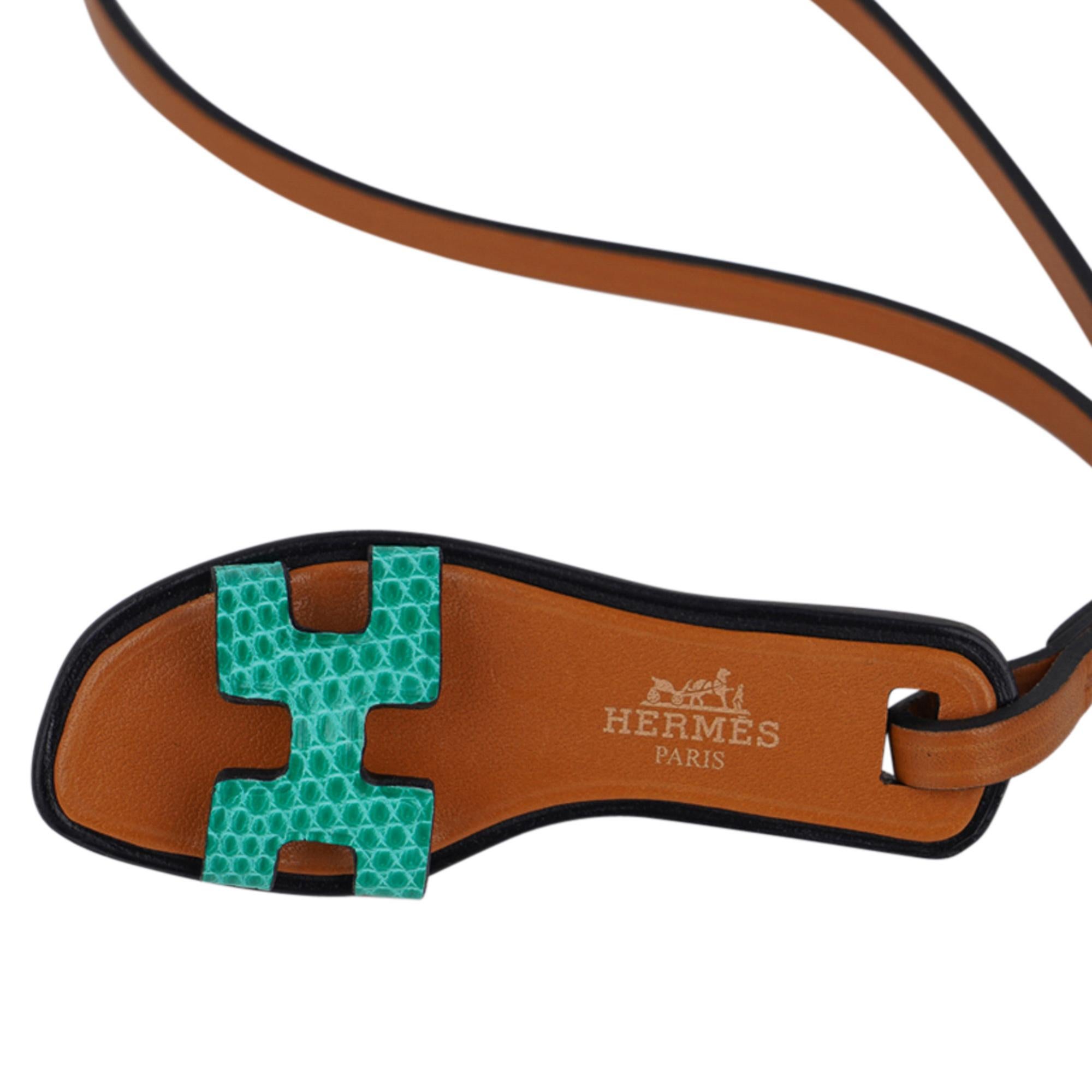 Mightychic offers an Hermes Oran Nano bag charm featured in fresh green lizard.
Charming and playful she easily adorns a myriad bag colours in your fabulous collection.
Hermes Paris hot stamp on the upper sole.
Comes with signature Hermes box and