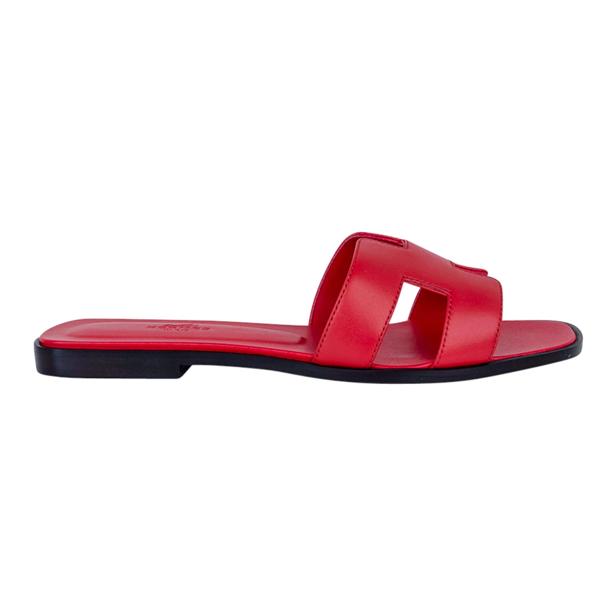 Hermes Oran vibrant Rose Cotinga pink flat sandal.
These rich, saturated pink slides are a must for foot flirting!
Hermes Paris embossed leather insole. 
Wood heel with leather sole.  
Comes with sleepers and and signature Hermes box. 
NEW or NEVER