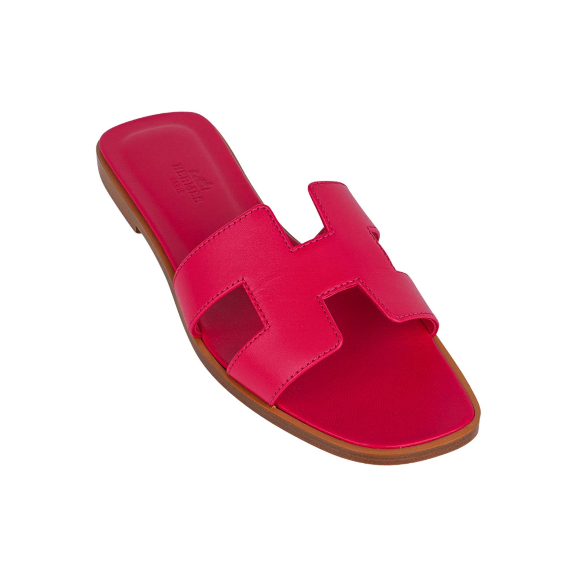 Mightychic offers guaranteed authentic Hermes Oran Rose Sorbet  pink flat sandal.
These rich, saturated pink slides are a must for foot flirting!
Hermes Paris embossed Rose Sorbet leather insole.
Wood heel with leather sole.
Comes with sleepers,