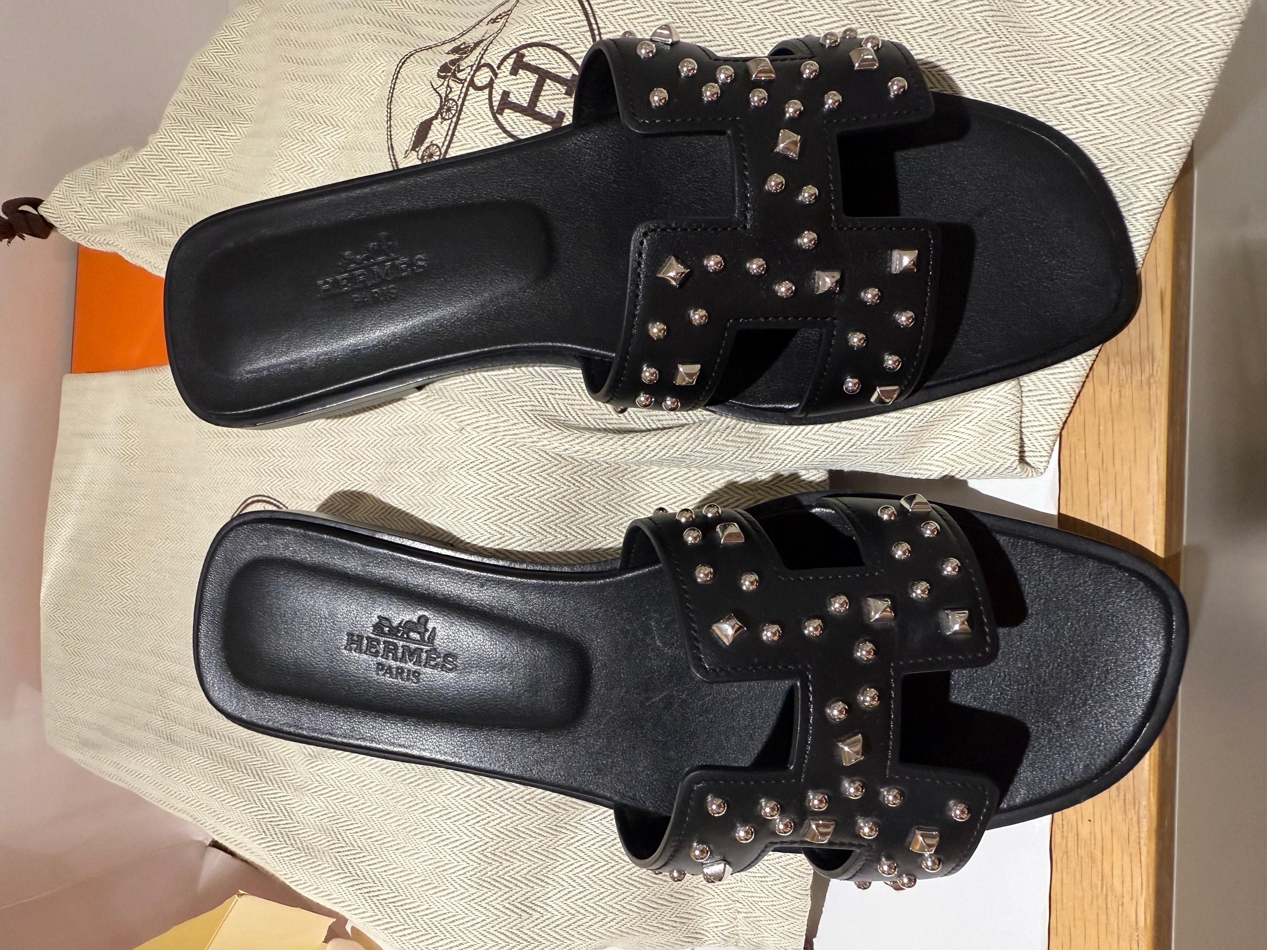 Hermes oran sandals black in calfskin with iconic 