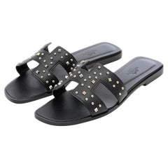 Sandali Hermes oran neri con borchie