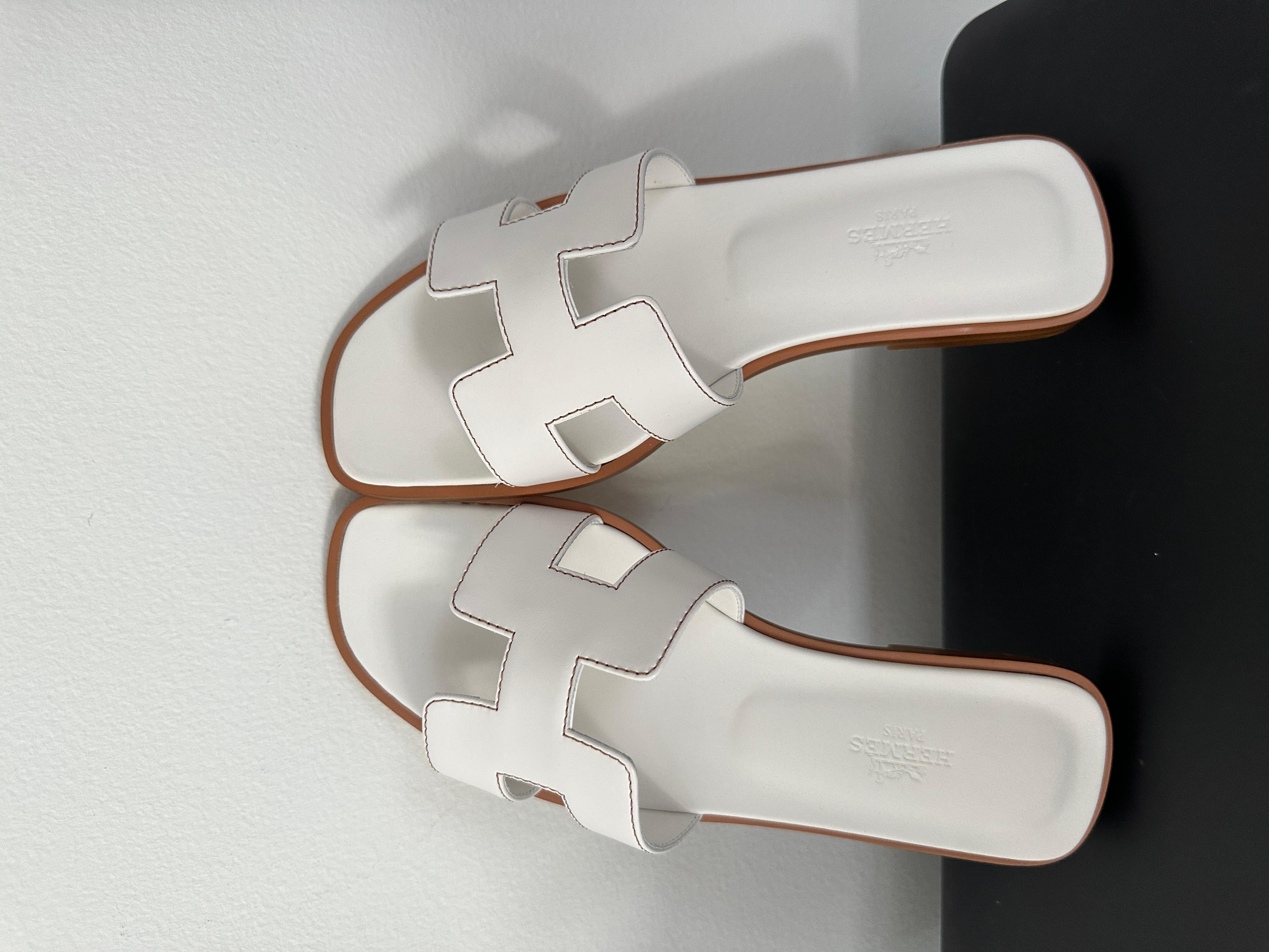The  Oran Sandal 
About the Oran sandal:
Hermes Oran is a style of sandal produced by the luxury fashion brand Hermes. The sandal features a simple, minimalist design, with a leather  upper and a flat sole. The Oran is available in a range of colors