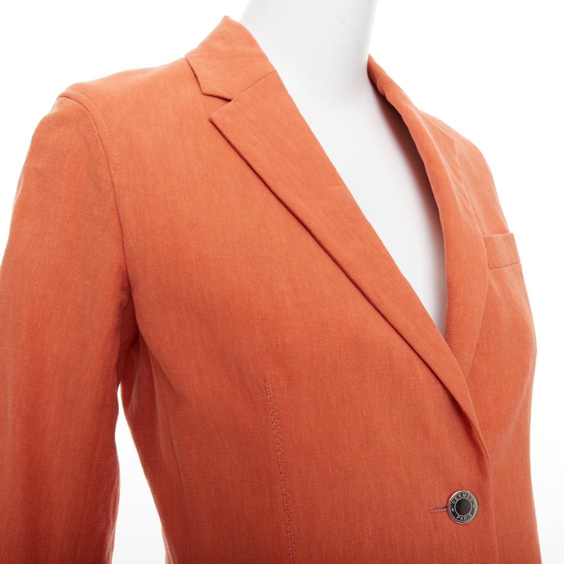 HERMES orange 100% linen logo buttons dual button blazer jacket FR34 XS
Reference: ZETO/A00014
Brand: Hermes
Material: Linen
Color: Orange
Pattern: Solid
Closure: Button
Lining: Orange Fabric
Extra Details: Full canvas. Double slits.
Made in: