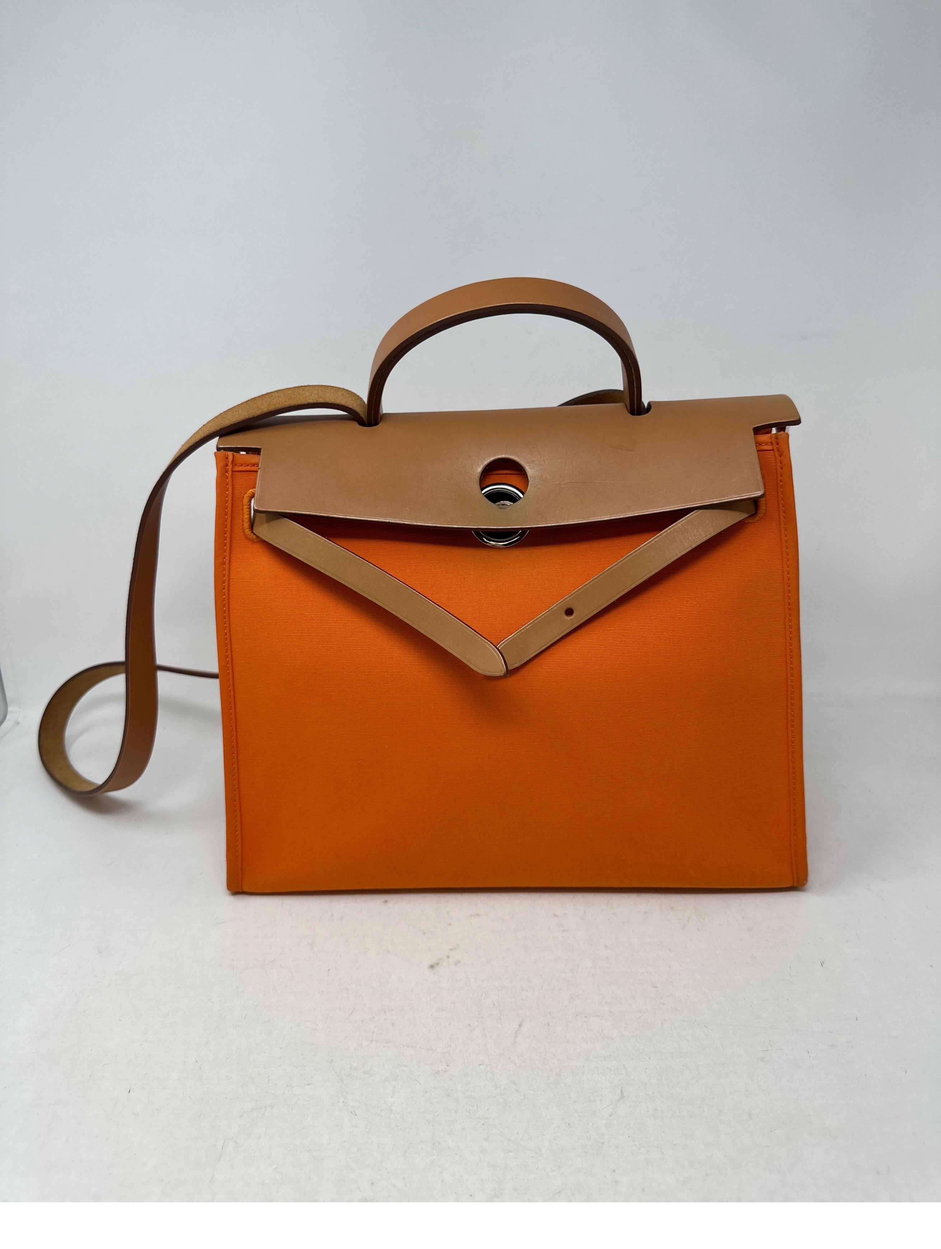 Hermes Orange 31 Her Bag. Q stamp. Excellent condition. Interior and exterior clean. Great crossbody bag. Includes pouch, padlock, key, clochette. Guaranteed authentic. 