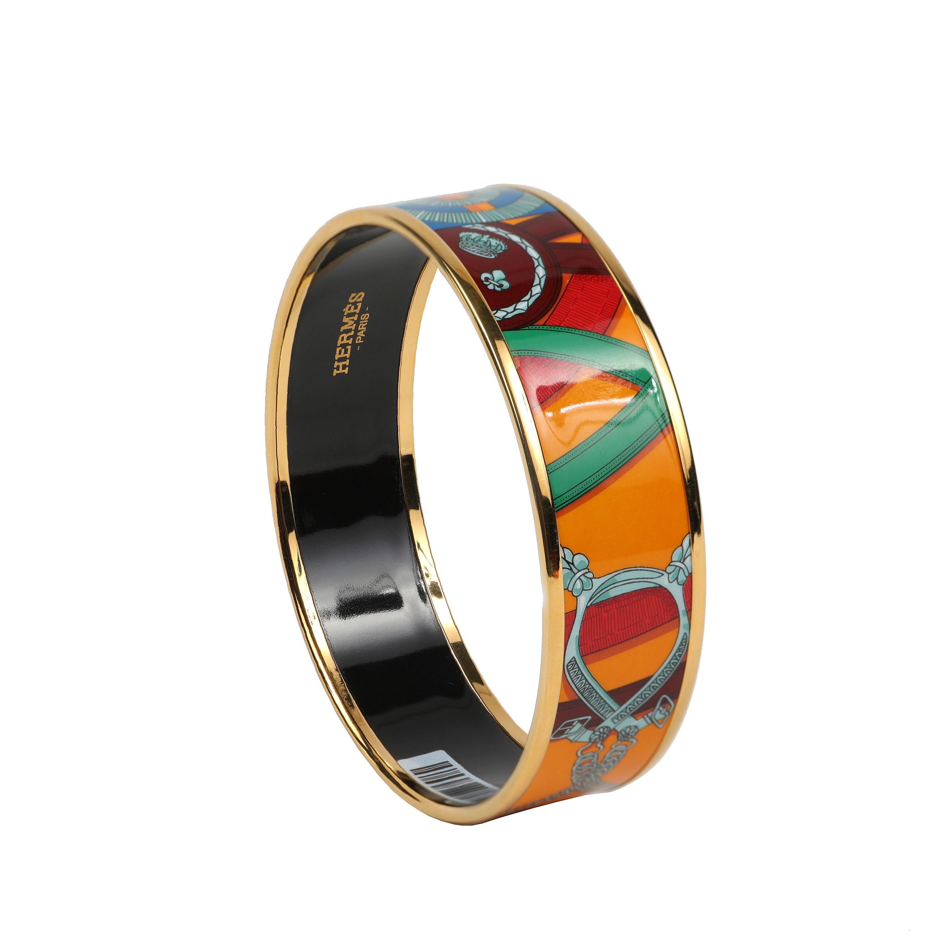 This authentic Hermès Orange and Blue Enamel Bracelet is new.  Brightly colored enamel bangle, equestrian theme.  Box or pouch included.

PBF 13985

