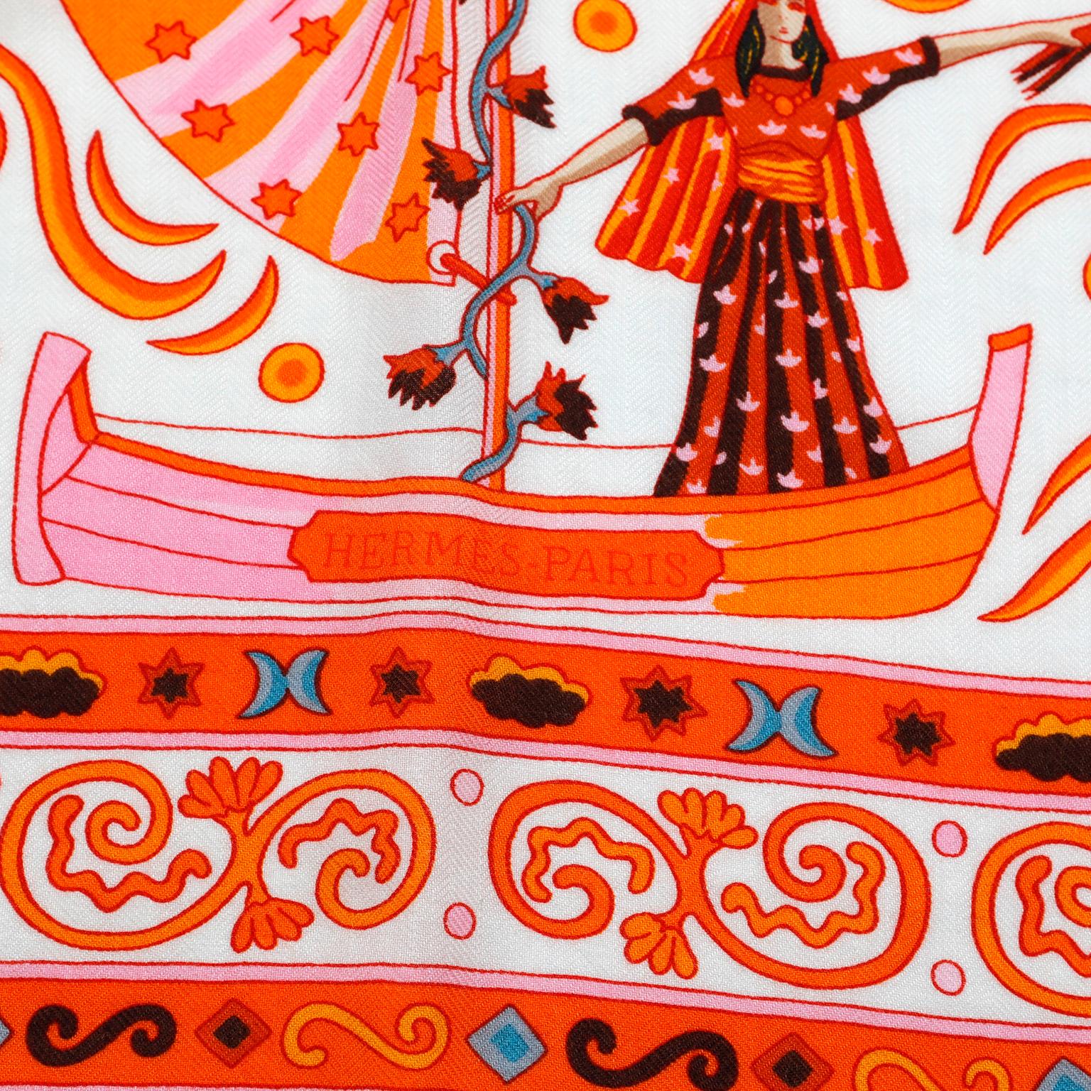 Cette authentique écharpe en cachemire Hermès Peuple du Vent orange et rose est en parfait état.  Le design met en scène des animaux et des artistes du peuple rom.  Conçu par Christine Henry.  Boîte incluse.

PBF 13392