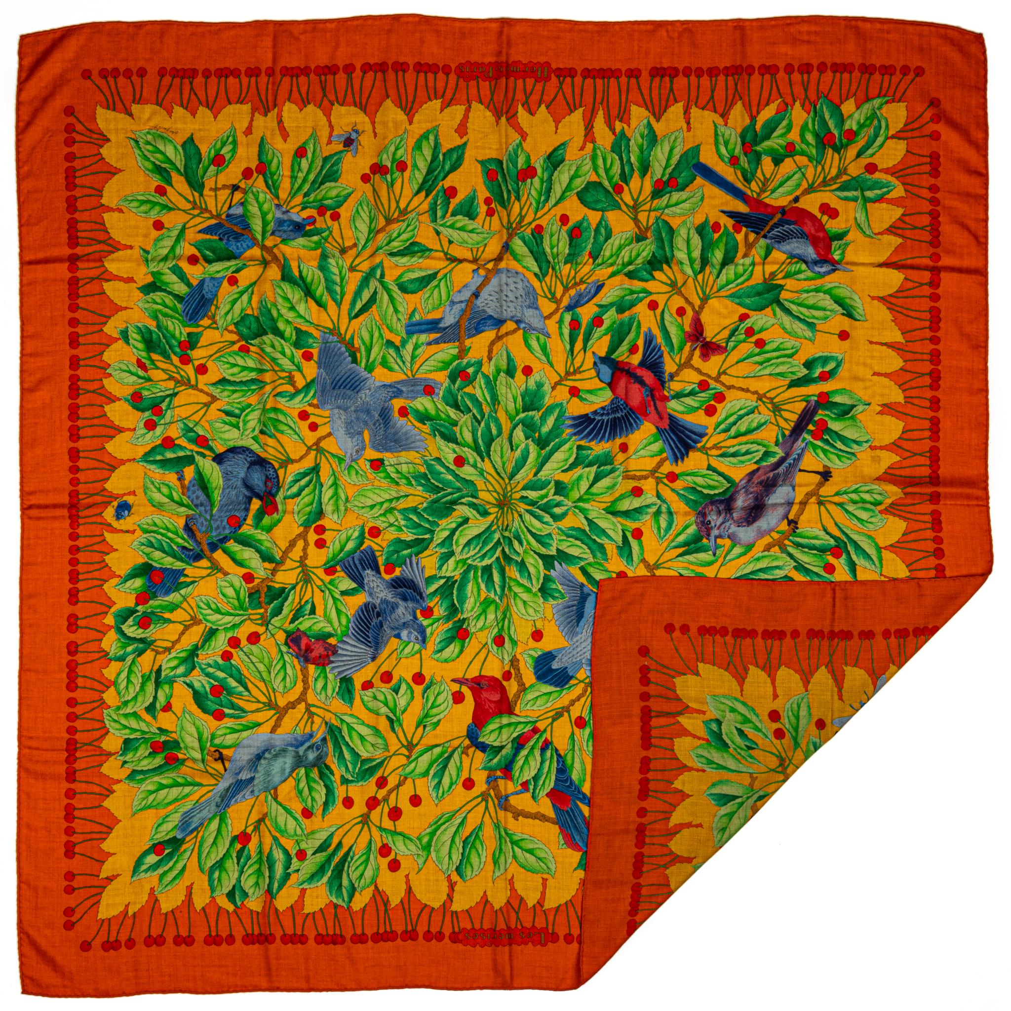 Hermès preowned orange and green shawl with birds design.65% cashmere 35% silk oversize shawl/scarf. Hand-rolled edges. Does not include box.
