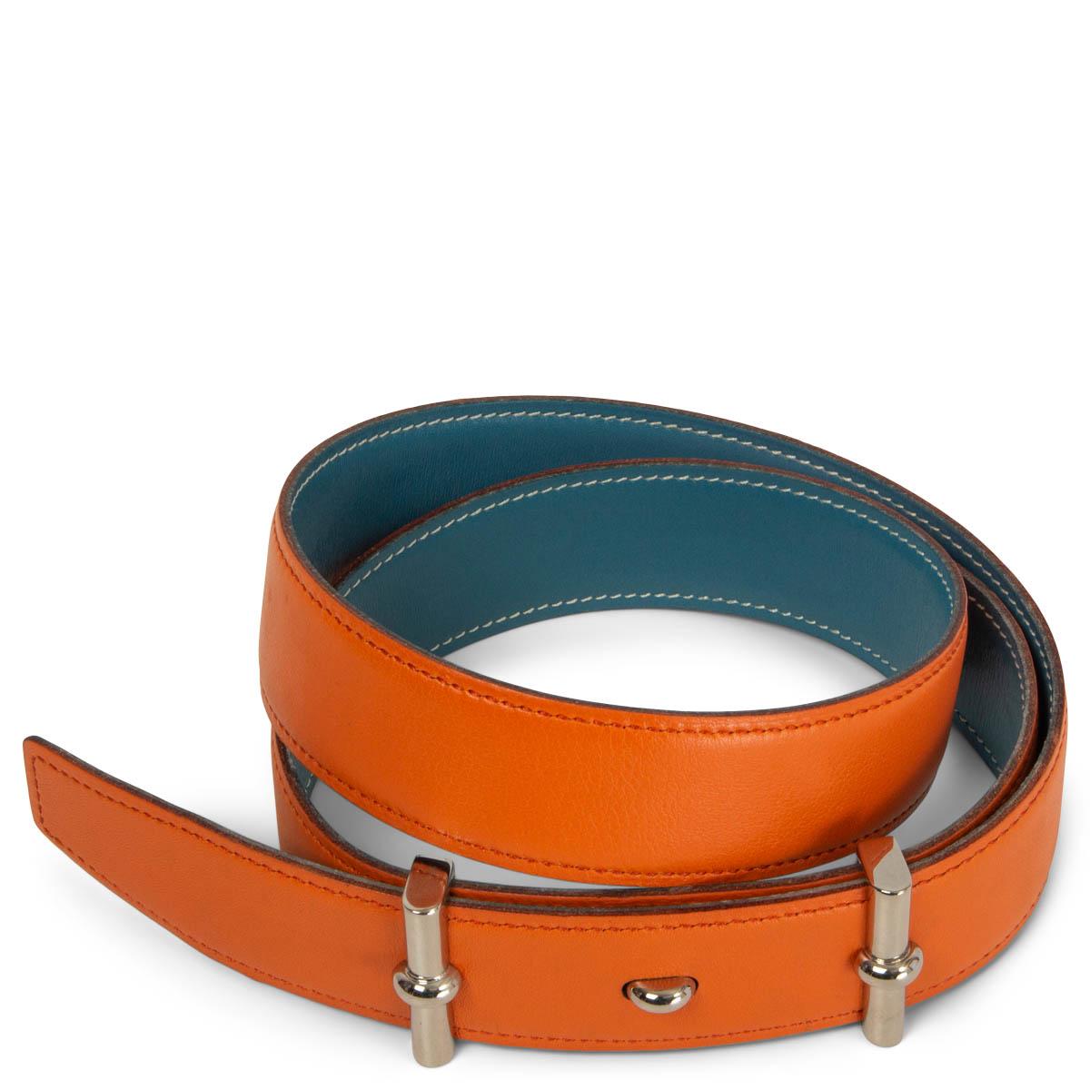 100% authentic Hermès Reversible 32mm Belt in Orange and Blue Jean Swift leather. Has been worn and shows some soft wear on the leather. Overall in very good condition. 

Measurements
Tag Size	75
Width	3.2cm (1.2in)
Fits	72cm (28.1in) to 78cm