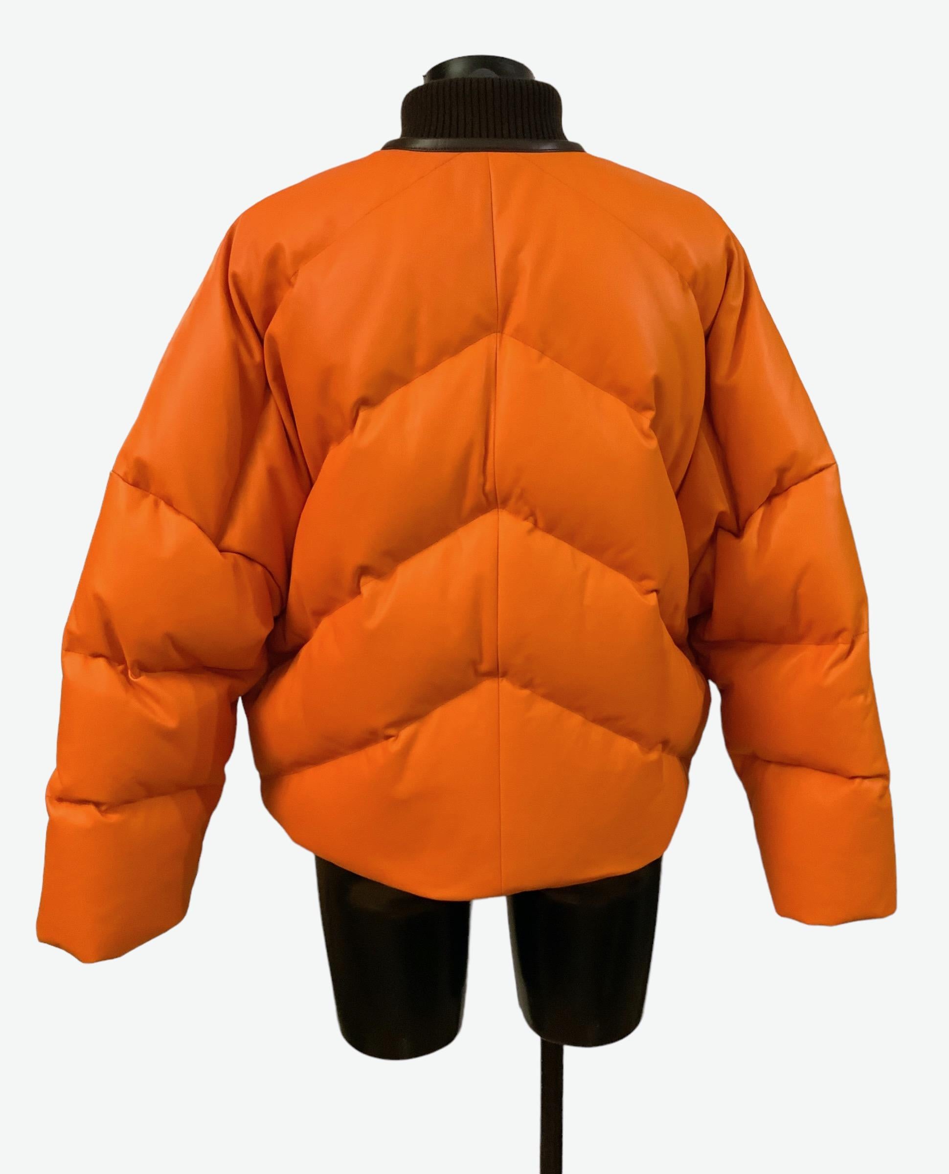 One of a kind for the house of Hermès !
Beautiful immaculate bomber jacket crafted in a very soft orange color calfskin leather.
The trims are made of lambskin and the ribs of cashmere.
The jacket is padded with goose down.

Material: Calfskin and