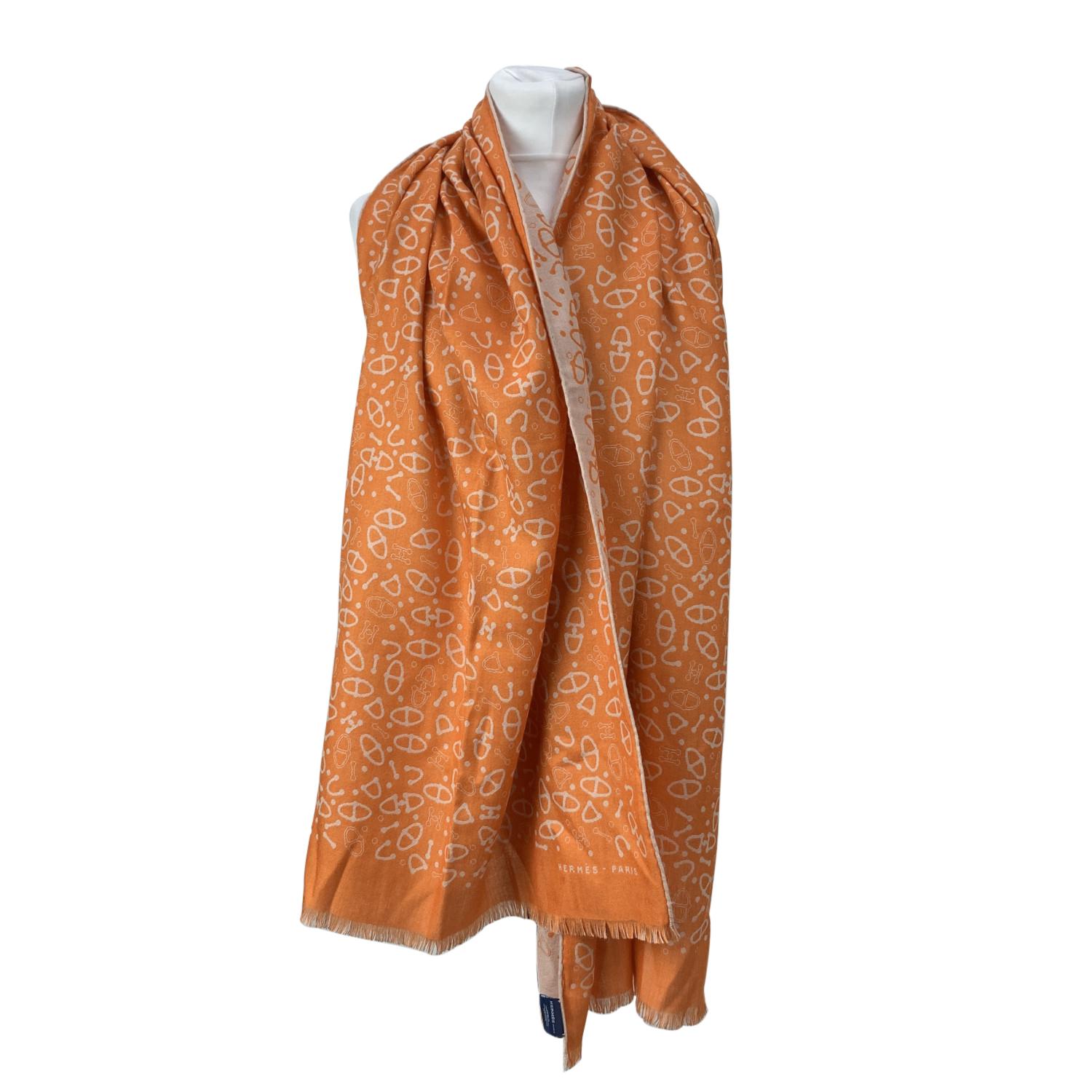 Hermes cashmere and silk reversible stole/scarf. 'Chain d'Ancre' motif. Composition: 70% Cashmere, 30% Silk. Frayed edges. Total length: 73 inches - 185 cm. Width: 24 inches - 61 cm. Hermes omposition tag is still attached.

Details

MATERIAL: