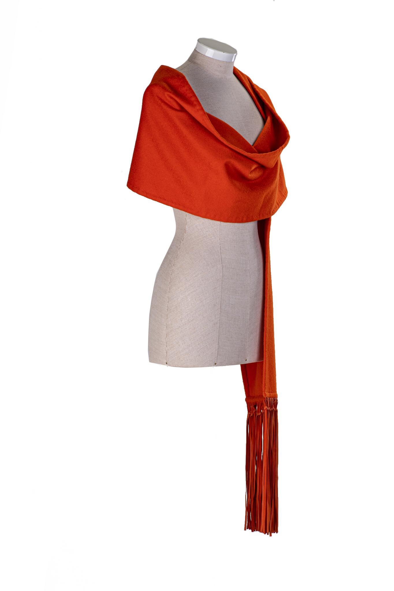 Hermès orange cashmere scarf with leather fringe. Excellent condition. No box.