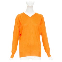 Maglione HERMES in cashmere e seta arancione con doppio scollo a V e maniche raglan, taglia FR34 XS