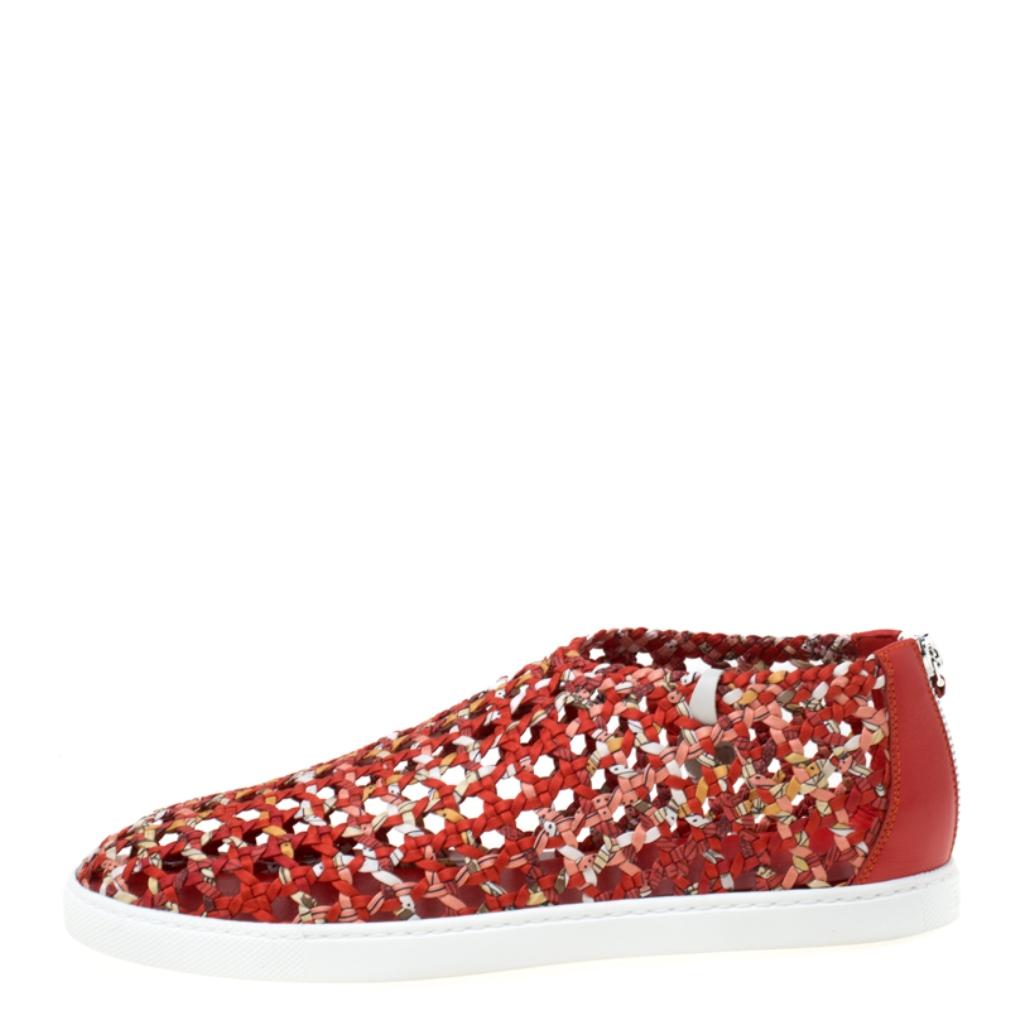 One's wardrobe is incomplete without a good pair of sneakers and what better than these Hermes ones! These low top sneakers have been crafted from braided silk and styled with round toes and zippers. They are complete with comfortable leather-lined