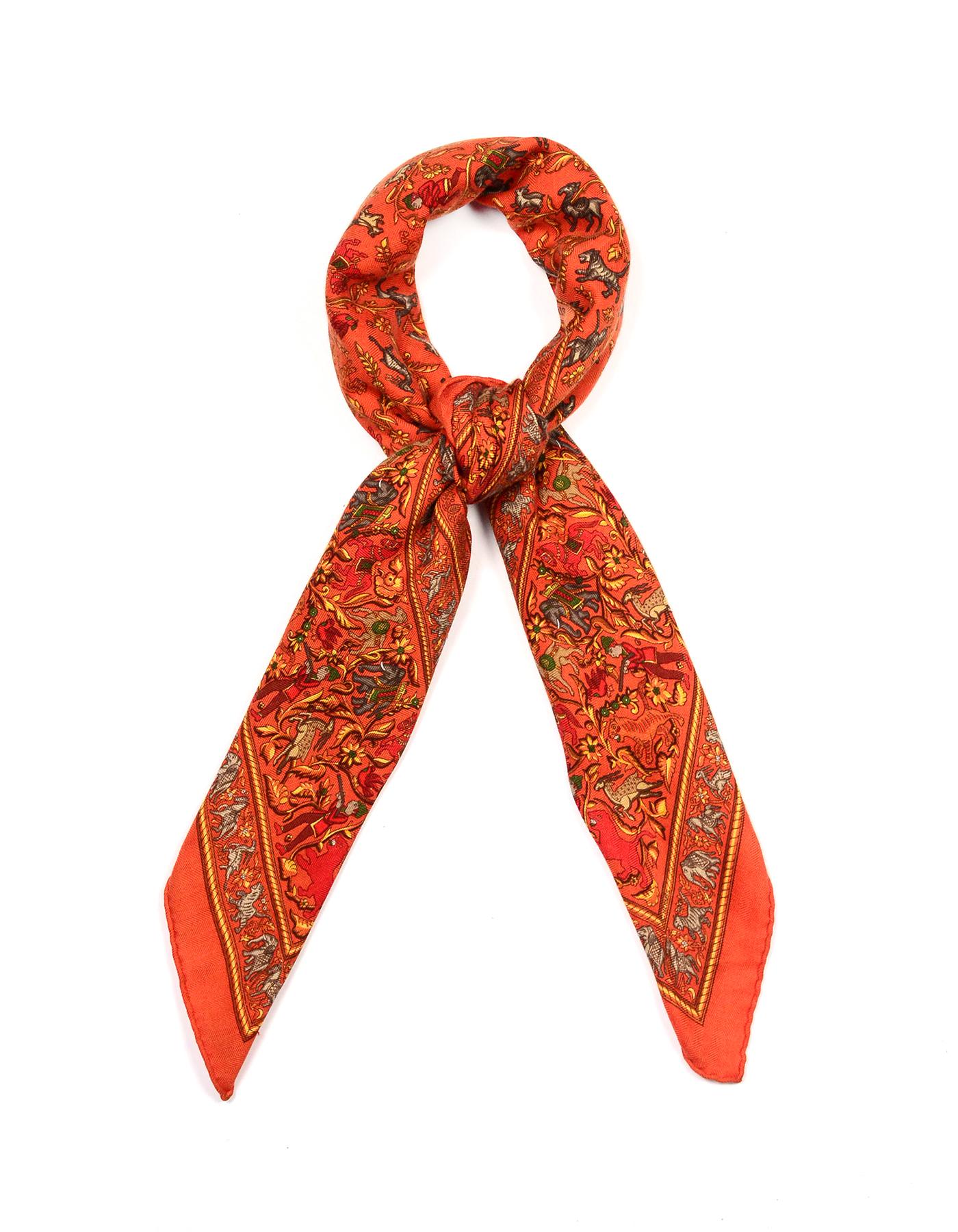Hermes Orange Chasse En Inde 90cm Silk/Cashmere Scarf

Made In: France   
Color: Orange
Materials: Silk, cashmere (no composition tag)
Overall Condition: Excellent pre-owned condition 

Measurements: 90cm
35