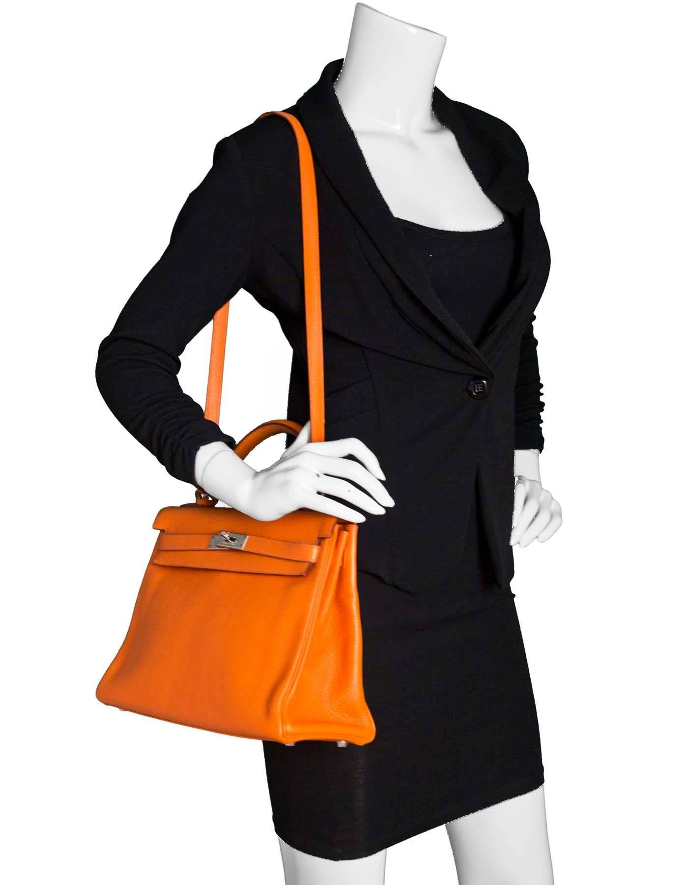 Hermes Orange Clemence 32cm Kelly Bag 
Features removable shoulder/crossbody strap

Made in: France
Year of Production: 2011
Color: Orange
Hardware: Palladium
Materials: Clemence leather
Lining: Orange chevre leather
Closure/opening: Flap top with