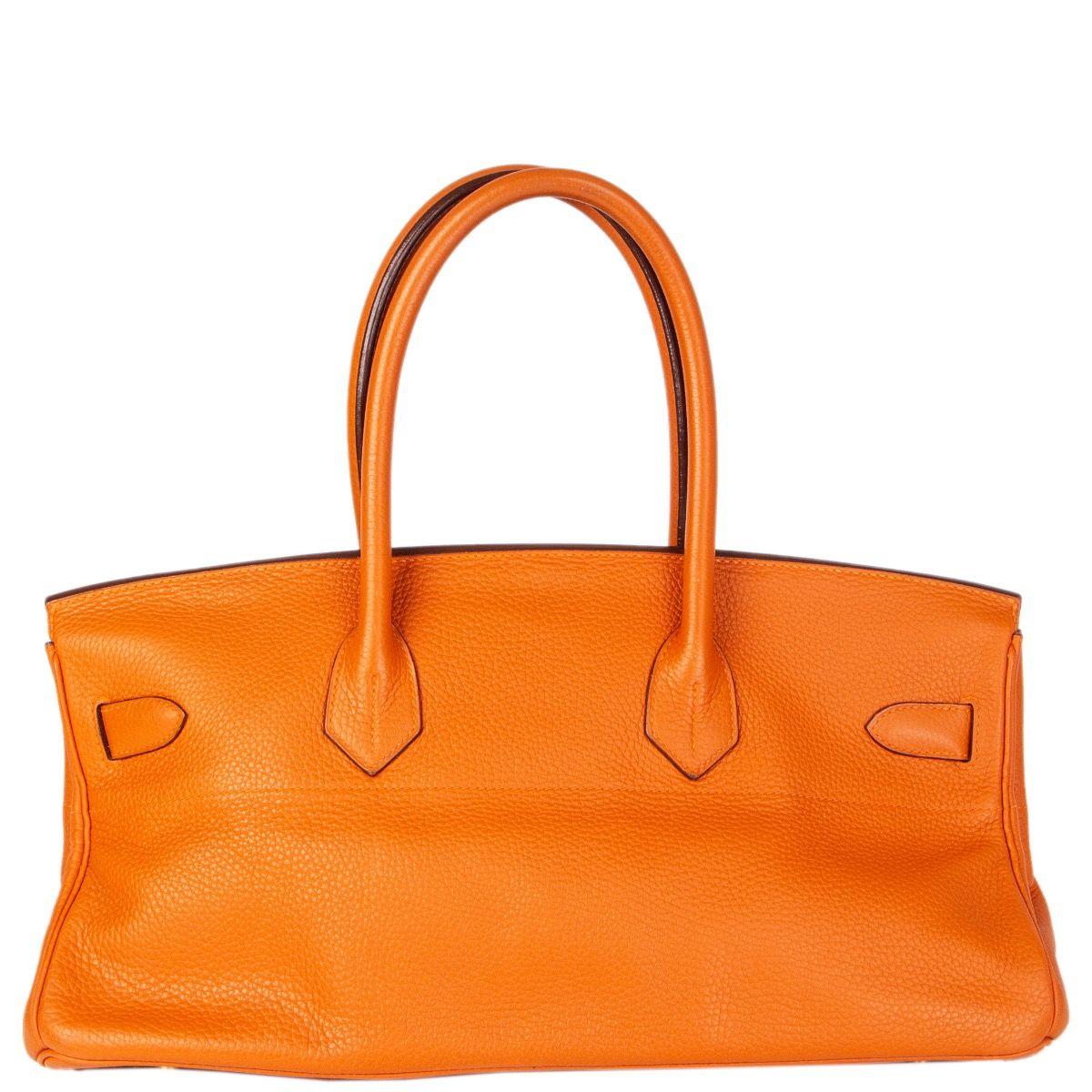 small orange birkin bag
