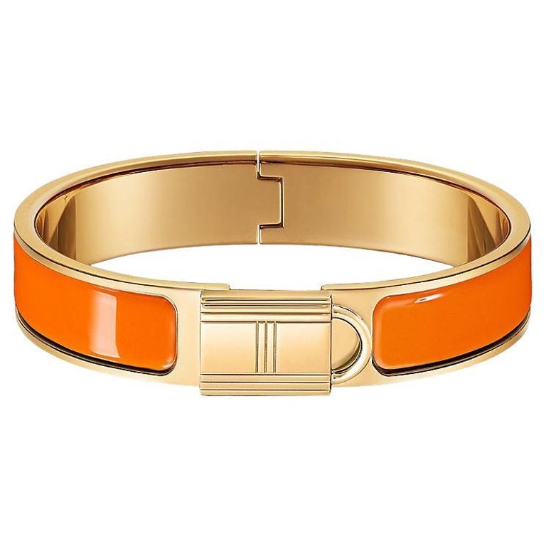Hermés Orange Clic Cadenas bracelet For Sale at 1stDibs