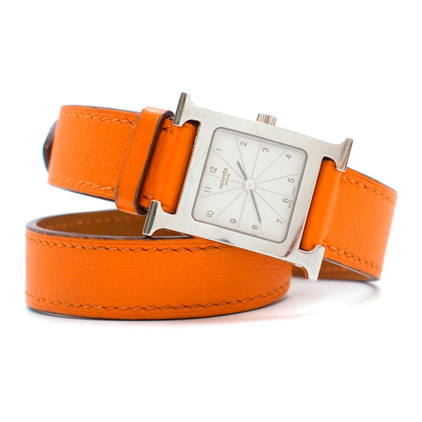 Hermes Orange Double-Strap Watch

-Orange wrap-around straps 
-Silver-tone hardware

Please note, these items are pre-owned and may show signs of being stored even when unworn and unused. This is reflected within the significantly reduced price.