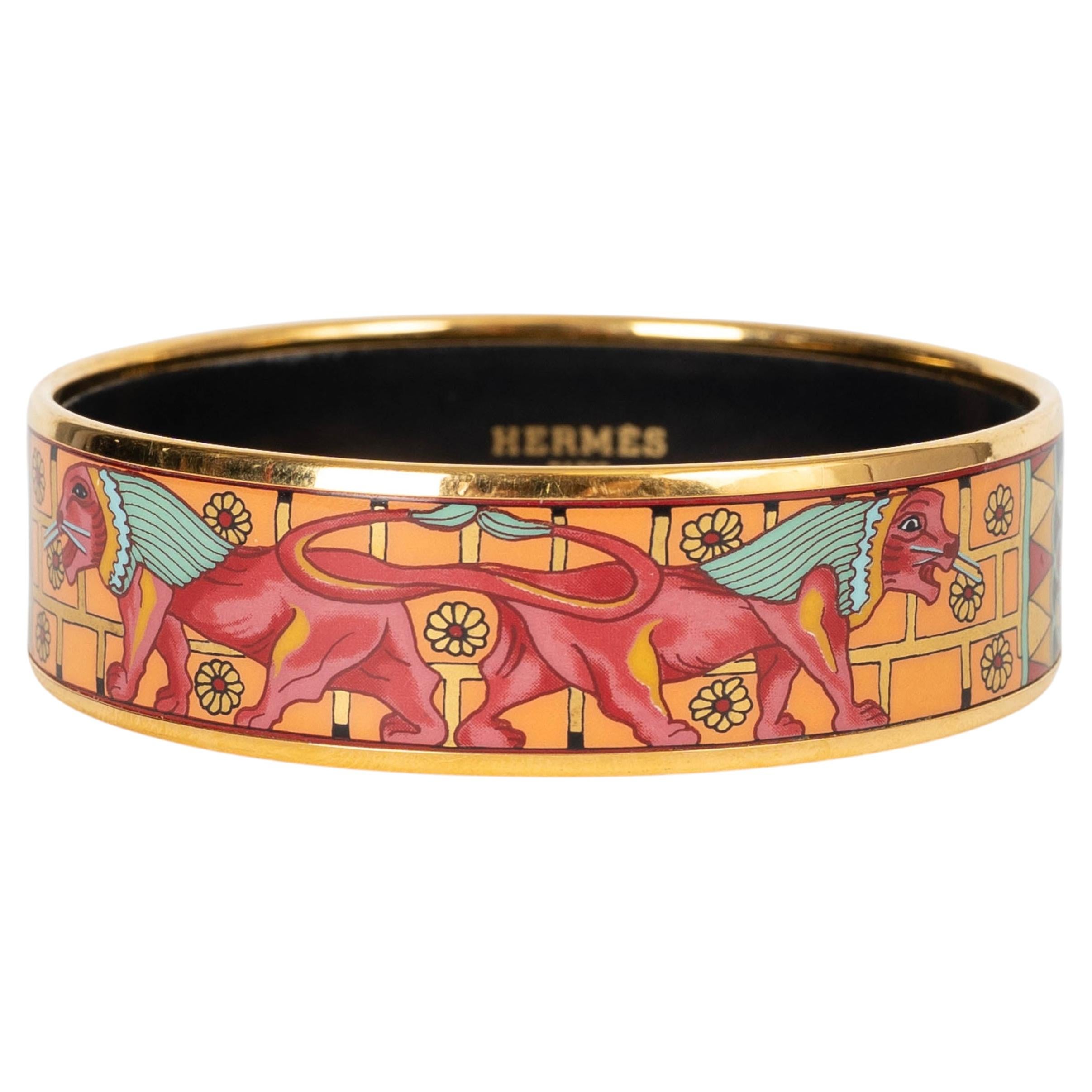 Bracciale HERMES "BABYLONIAN LIONS WIDE" con smalto arancione GHW in vendita