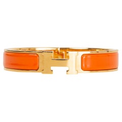 HERMES orange enamel CLIC H PM Bracelet Gold