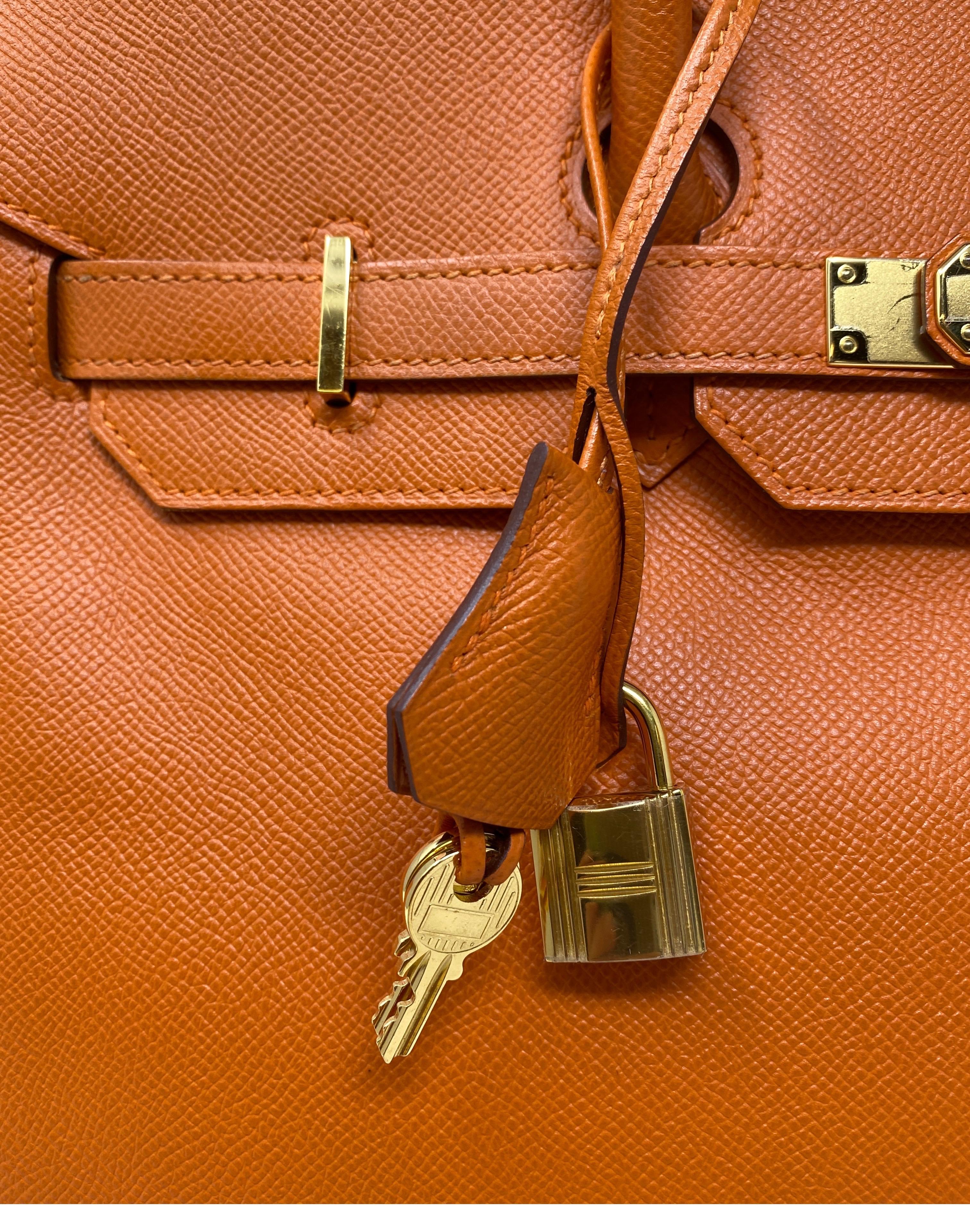 Hermes Orange Birkin 35 Bag. Epsom leather. Gold hardware. Excellent condition. Beautiful most wanted leather. Lighter epsom leather. Beautiful combination. Classic investment bag. Includes clochette, lock, keys, and dust cover. Guaranteed