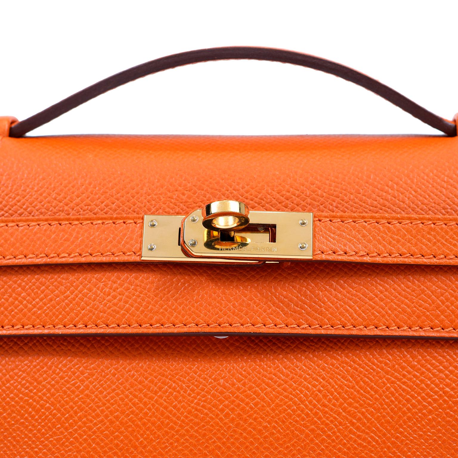 Hermès Orange Epsom Kelly Pochette with Gold Hardware 1